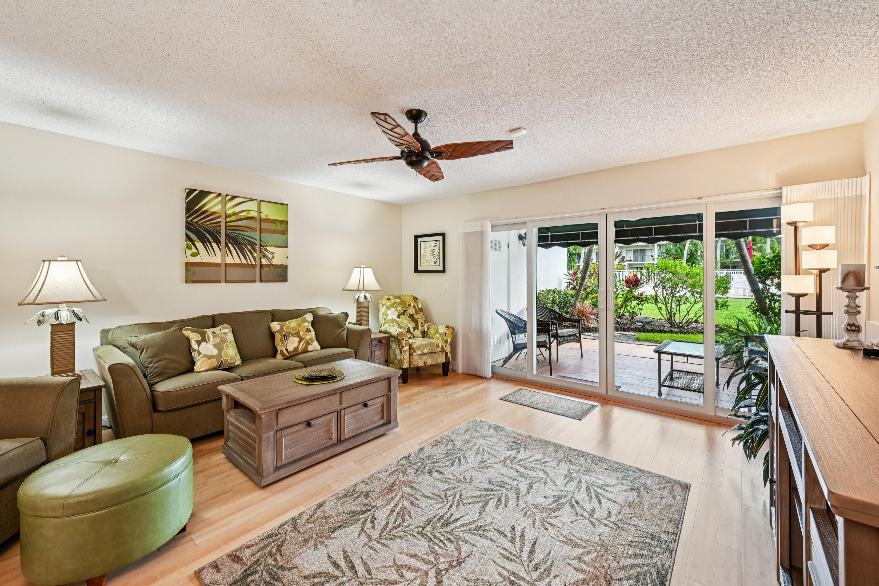 Welcome to this highly sought-after waterfront community of Royale Harbour! This townhome offers a premier lifestyle with its prime location and desirable features. Step inside to find bamboo hardwood floors, a kitchen with recessed LED lighting, and stainless-steel appliances. The home features 3 BR and 2 bth, including a master suite with a second-floor balcony overlooking the pool. Recent 2023 upgrades provide peace of mind, including a HW heater, metal roof and gutters, and impact hurricane windows and front door. Enjoy a front-row seat to the Intracoastal Waterway for the Holiday Boat Parade and more. Just a short walk from the pool and tennis/pickleball court. A day dock provides easy water access. Located close to great shopping, top restaurants and the beach. Rare opportunity!