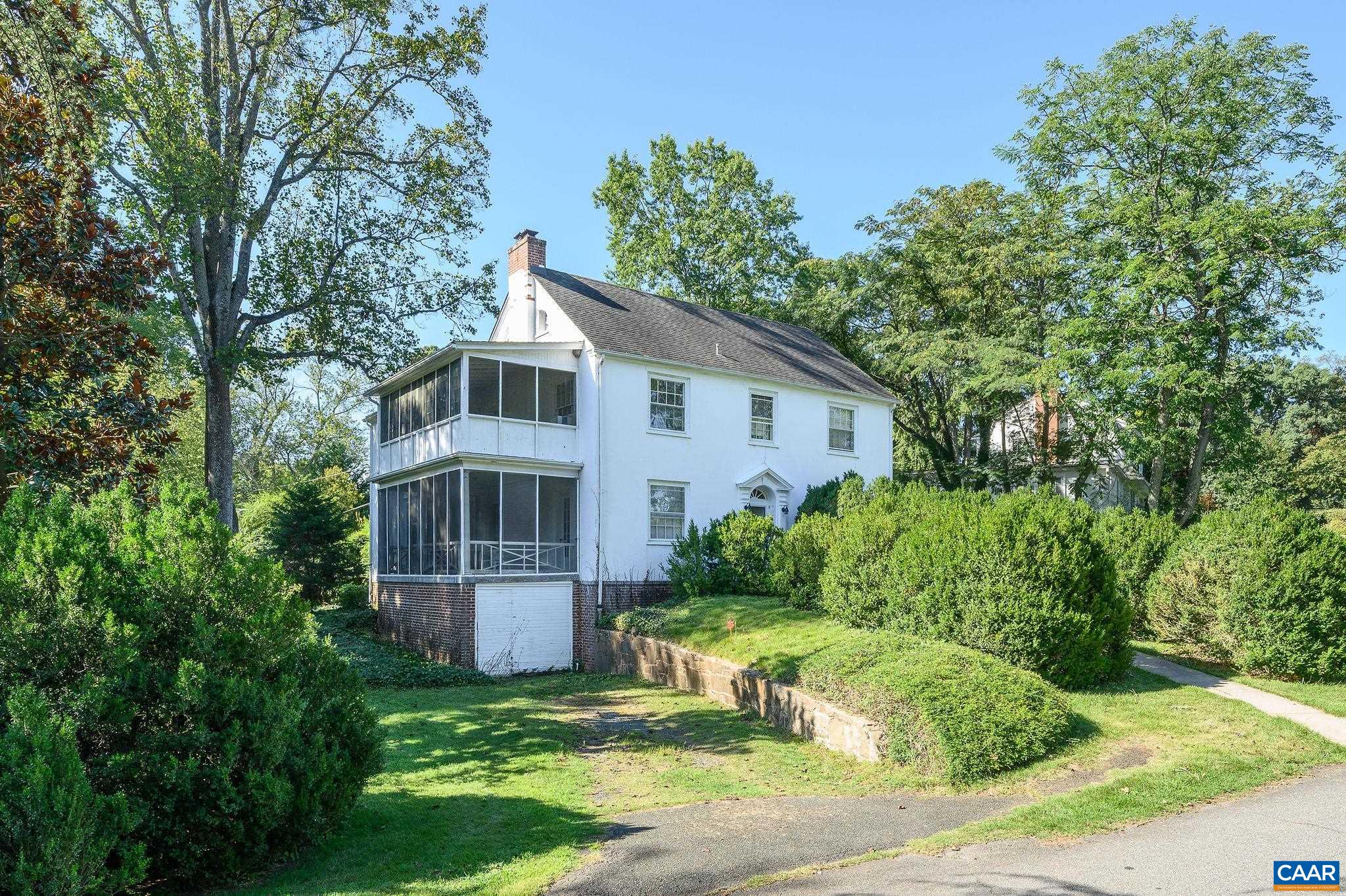 UVA Lewis Mountain home with great bones. Expanded, formal living and dining rooms, den, kitchen, butler's pantry, half bath, screened porch. The second floor features a sleeping porch, large ensuite second level primary option (two bedrooms combined), two additional ensuite bedrooms, fourth bedroom and hall bath. Enjoy the walk-up finished attic with two rooms and a full bath. Basement features laundry, bathroom, garage, abundant storage.43 acre lot fronts on Bollingwood Road and Cameron Lane is a great lot division candidate. The lot also allows easy access to add a guesthouse, studio, or garage with apartment above. Purchaser to verify lot modifications and building code with the city.