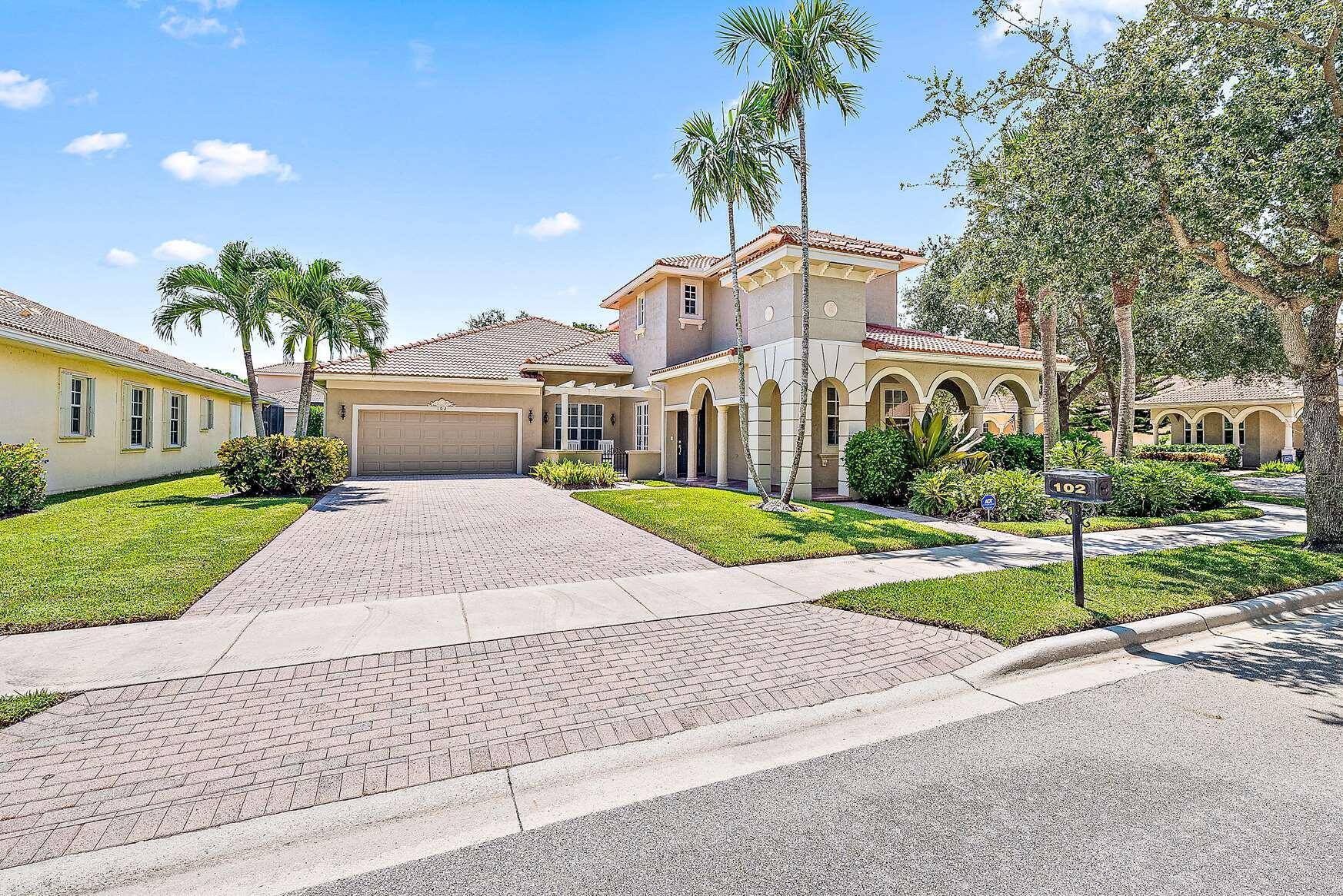 BEAUTIFULLY UPDATED AND FURNISHED TWO STORY HOME WITH THE MASTER SUITE ON THE GROUND FLOOR. SPACIOUS OPEN KITCHEN WITH BREAKFAST AREA AND LARGE FAMILY ROOM WHICH OPENS TO THE EXPANDED COVERED LANAI AND INVITING FENCED YARD WITH PRIVACY HEDGES. CABANA BATH WITH SHOWER. BEAUTIFUL LIVING ROOM AND DINING AREA OFF THE KITCHEN PERFECT FOR DINNER PARTIES. FIRST FLOOR GUEST SUITE OR GREAT HOME OFFICE WITH 2 ADDITIONAL GUEST SUITES UPSTAIRS. LUXURIOUS MASTER SUITE WITH DUAL CLOSETS AND SPACIOUS SPA LIKE BATHROOM. FULL LAUNDRY AND AN EXPANSIVE GARAGE AND DRIVEWAY. WONDERFUL CORNER LOCATION WITH NO HOMES ACROSS AND A HUGE GREEN SPACE. COMMUNITY HAS TENNIS AND POOL ALL MINUTES TO ABACOA AND ALTON PLUS THE BEACH