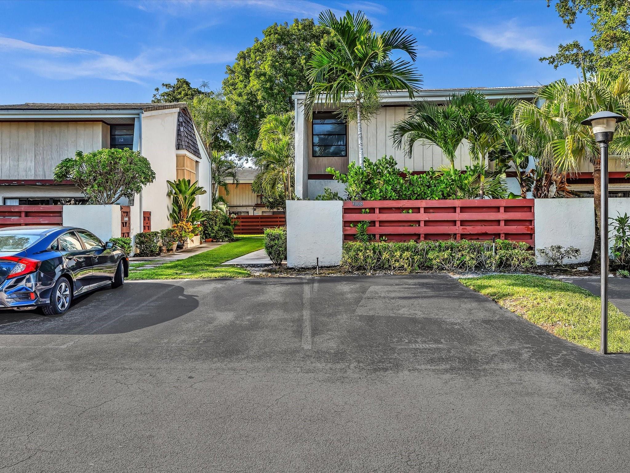 Beautifully Updated Corner Unit Townhome in the Lakes of Emerald Hills.  Over $100,000 in recent renovations.  Unit features two patios and a balcony; dedicated theater room with 120 inch ambient light rejection projector screen, theater grade 4K laser projector, and premium sound system; 3 fully renovated bathrooms with modern finishes; new waterproof laminate wood flooring and new baseboards throughout; new kitchen appliances; brand new stackable washer & dryer combo (upstairs); AC 2 years old; roof replaced in 2017.  Prime location in the highly desirable Lakes of Emerald Hills community.  Location Highlights: directly across from a park with playground, dog park, and walking trail; just steps from the community pool; walking distance to places of worship.