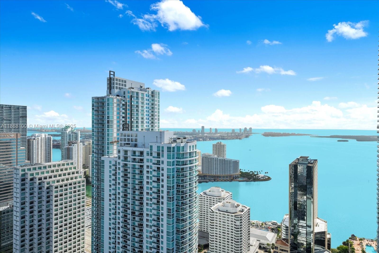 Experience elevated living in this stunning lower penthouse with a private elevator, high ceilings, and an open balcony offering breathtaking Biscayne Bay views. This 2-bedroom + den, 3-bath residence spans 1,283 SF of light-filled space, featuring tile floors, custom cabinetry, and floor-to-ceiling windows that capture panoramic water views. Resort-style amenities include a bar, basketball courts, billiard room, BBQ/picnic area, business center, clubhouse, fitness center, and hobby room. Enjoy the best of Brickell’s vibrant lifestyle with luxury, privacy, and world-class conveniences.