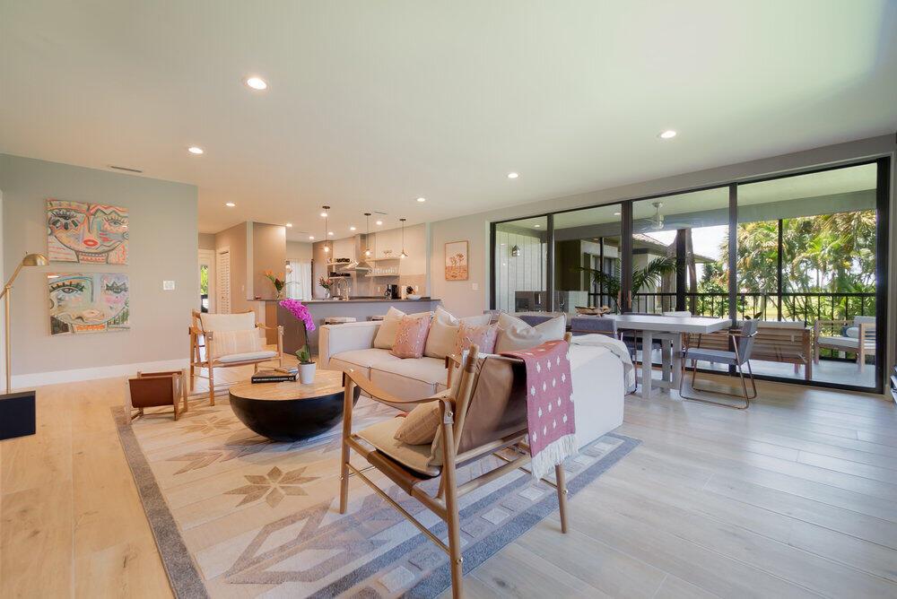 Renovated to perfection, this sensational property situated in the esteemed Palm Beach Polo Club offers a truly remarkable living experience. Meticulously redesigned with contemporary flair, the residence exudes sophistication and style. Featuring an open floor plan adorned with top-of-the-line finishes and furnishings, including a state-of-the-art kitchen and integrated social spaces, every detail has been carefully curated to ensure modern elegance and comfort. The master bedroom boasts refined touches such as designer light fixtures and a spacious walk-in closet. Step outside to the covered patio, where you'll find breathtaking views of the meticulously landscaped grounds. With its recent transformation, this apartment epitomizes contemporary luxury living at its finest.