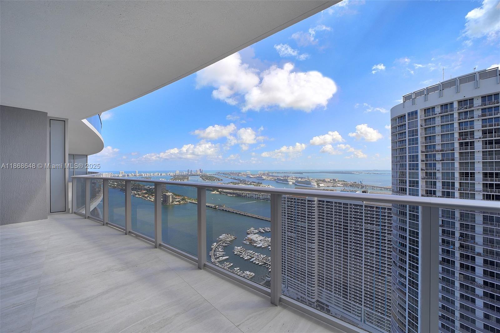Amazing Unit with ceramic stone flooring throughout. 1 Bedroom + Den 2nd bedroom with ensuite bathroom, 2 full bathrooms. Private Elevator. Walk in closet.1 assigned parking space. Building has 2 pools, kids game room, movie theatre, gym, recreational areas - best amenities in neighborhood. Walking distance to lots of restaurants & shopping.