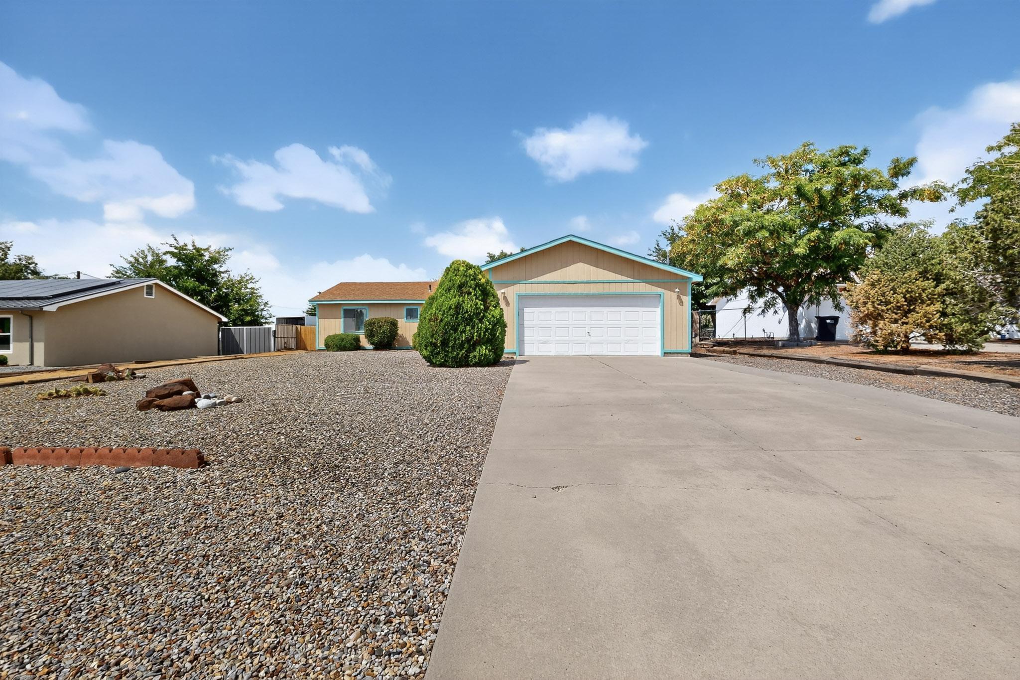 Fully renovated in 2022, this Rio Rancho home is move-in ready with modern updates throughout. Enjoy refrigerated air, bright open spaces, and stylish finishes. Situated on a fully walled 0.5 acre lot with low-maintenance landscaping, the property offers privacy and plenty of room to spread out. Backyard access leads to an extra garage and workshop, perfect for storage, hobbies, or projects. A rare find combining updates, space, and functionality in a great location!
