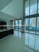 Near everywhere you want to be. 1 Bed 1/1.5 Bath One of a kind 2-story townhouse with views to the Miami River. Largest one bedroom unit in Epic. White  porcelain flooring, 8 foot ceiling height, 2 balconies, spectacular bathtub + rain shower. Amenities include pool, 2 restaurants, fitness center, bar, lounge, salon, sauna, play area, 24-hr concierge, valet, and much more. A few blocks away from Downtown, Bayside, Brickell, fine dining, night life and more. Don't miss this opportunity.
