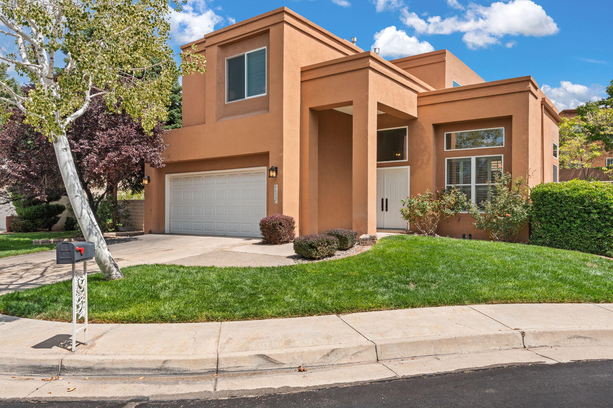 Freshly remodeled two-story home in highly sought after Tanoan East.  With four bedrooms and three bathrooms, this home has an excellent layout that gives the homeowner great options for rest and relaxation or entertaining of guests.  With lots of windows and natural light inside you can enjoy the natural beauty of Albuquerque without ever leaving  the comfort of your home.  Located on a cul-de-sac in one of Albuquerque's premier gated communities, this home is abound with comfort and tranquility.