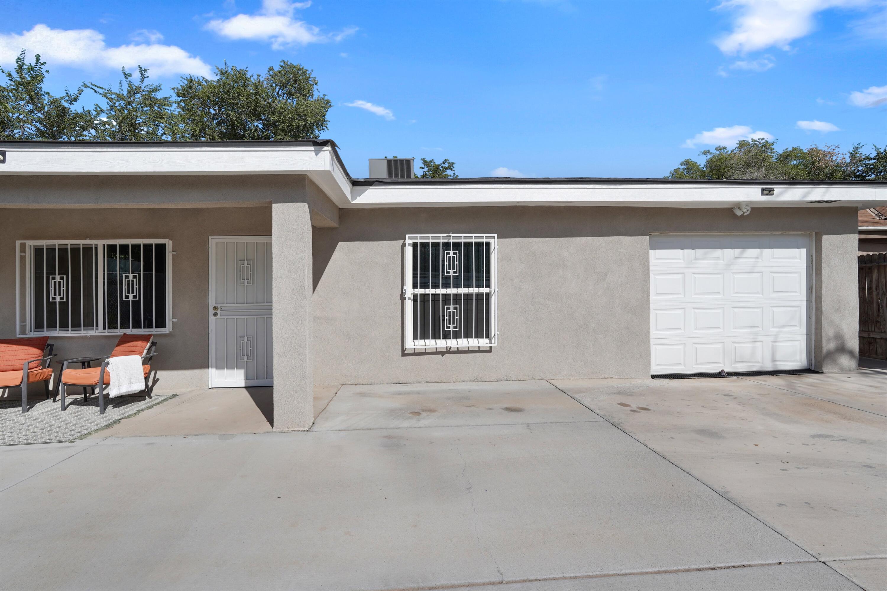 Newly renovated from top to bottom! This South Valley charm offers an abundance of natural light, an open concept, spacious bedrooms, large kitchen with plenty of cabinet and counter space,  and an epoxy finished garage! This home is turn key and ready for it's new owners!
