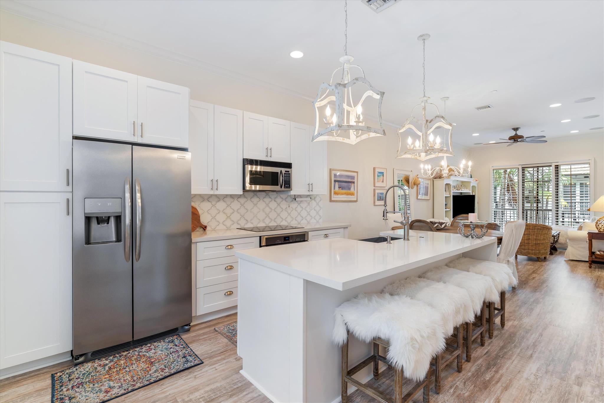 Rarely available interior unit in Renaissance Village - Downtown Delray Beach. A one-of-a-kind Renaissance Village home where downtown living makes a car optional. This completely updated residence showcases soaring 11-foot ceilings in the main living area and meticulous renovations that set it apart from anything offered. From the moment you enter, you'll notice the exceptional attention to detail--every space has been reimagined with thoughtful upgrades and a refined sense of style. 
Designed for both comfort and coastal sophistication, the open layout is filled with natural light, highlighting the upgraded interiors. This home offers a rare opportunity for buyers seeking a true move-in-ready property with elevated design, premium craftsmanship, and timeless appeal.

Perfectly positioned just steps from both vibrant Downtown Delray and Delray's award-winning beach, 607 Renaissance Lane offers the ultimate blend of convenience, lifestyle, and coastal luxury.