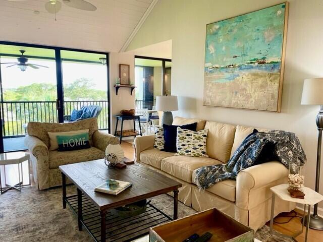 Beautiful Intracoastal views complement this lovely furnished condo, designed for both comfort and style. Enjoy a spacious screened-in balcony, the perfect spot to watch yachts glide by while relaxing and taking in the serene waterway views. The interior features vaulted ceilings and an open concept layout, enhancing the bright and airy coastal ambiance.The generously sized master bedroom boasts picturesque intracoastal views. The 3rd bedroom enjoys a sofa bed, desk, and charming French doors overlooking the waterway.  Additional amenities include a manned entrance, a designated carport, and extra storage, making life here effortless.The pool also overlooks the Intracoastal & lots of green spaces, walking paths, and tennis courts, all add to its inviting charm. Jupiter Harbour is conveniently located within walking distance to Love Street, the new hotspot for outdoor living in Jupiter, featuring a variety of restaurants and activities. The popular restaurant "1000 North" is just at the entrance of the community.