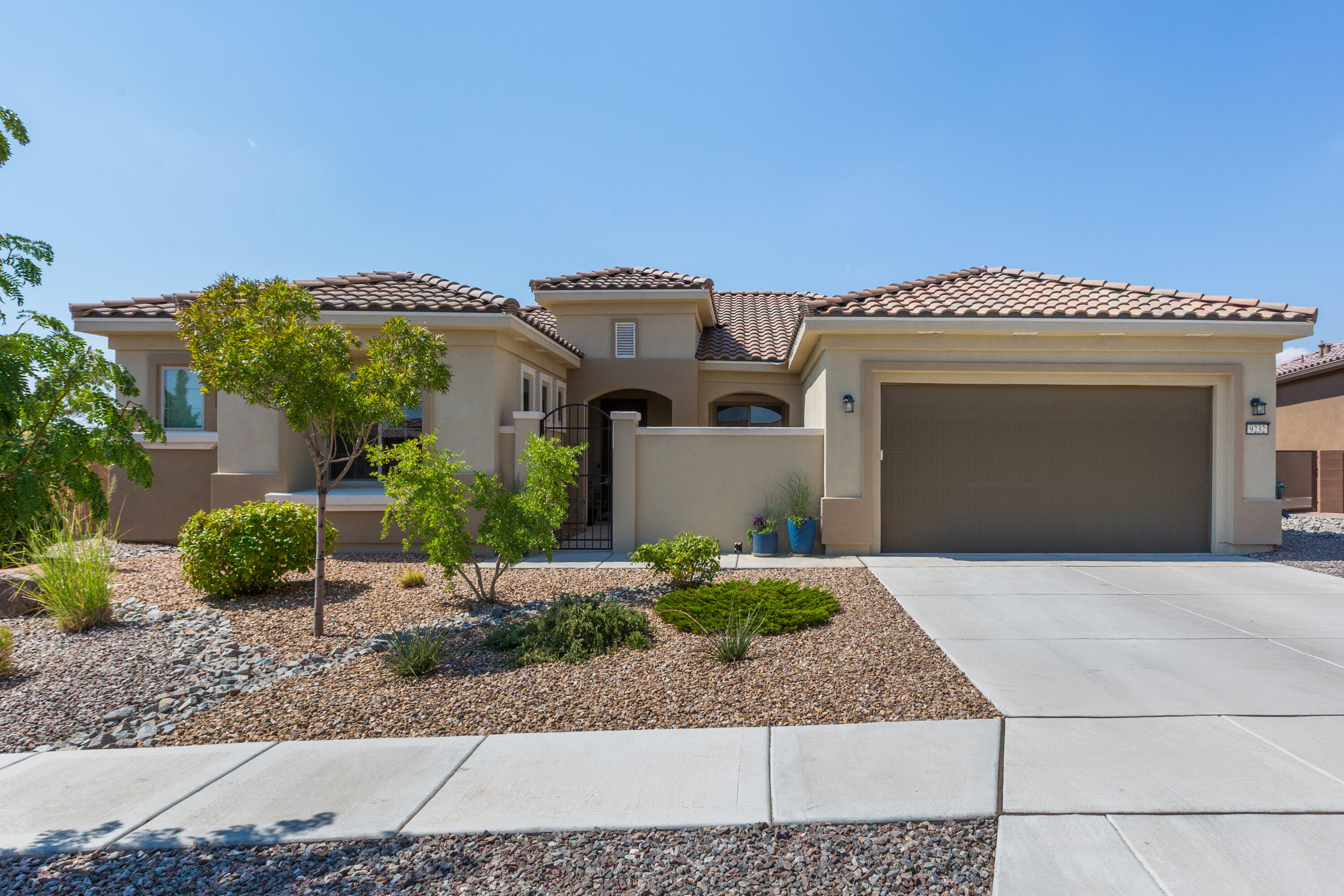 Stunning Home Located in Del Webb Mirehaven situated on a Premium .22ac VIEW LOT!! This 2591SF 'Endeavor' has a great open floorplan, 2 Primary Suites, Office or Flex Room, Guest Bath & a large Oversized 2 Car Garage w/Storage area! Original Owners built the home in 2018 with many upgrades including: Butlers Pantry, Two Ovens, Beautiful Ugraded Floor Tile, Tile Backsplash, Huge Center Sliding Door, Courtyard, Fireplace, Large Sink along w/ additional cabinets in the Laundry Room, Garage Service Door, Level 5 Granite throughout, Raised Dishwasher at the Island, Primary Bedroom has a Bow Window, large shower, separate sinks &  large WIC. Second Primary has a full bath.  There is also a half guest bath! You'll love the Sandia Amenity Center w/daily activities, pickleball, gym, pool, etc!!!
