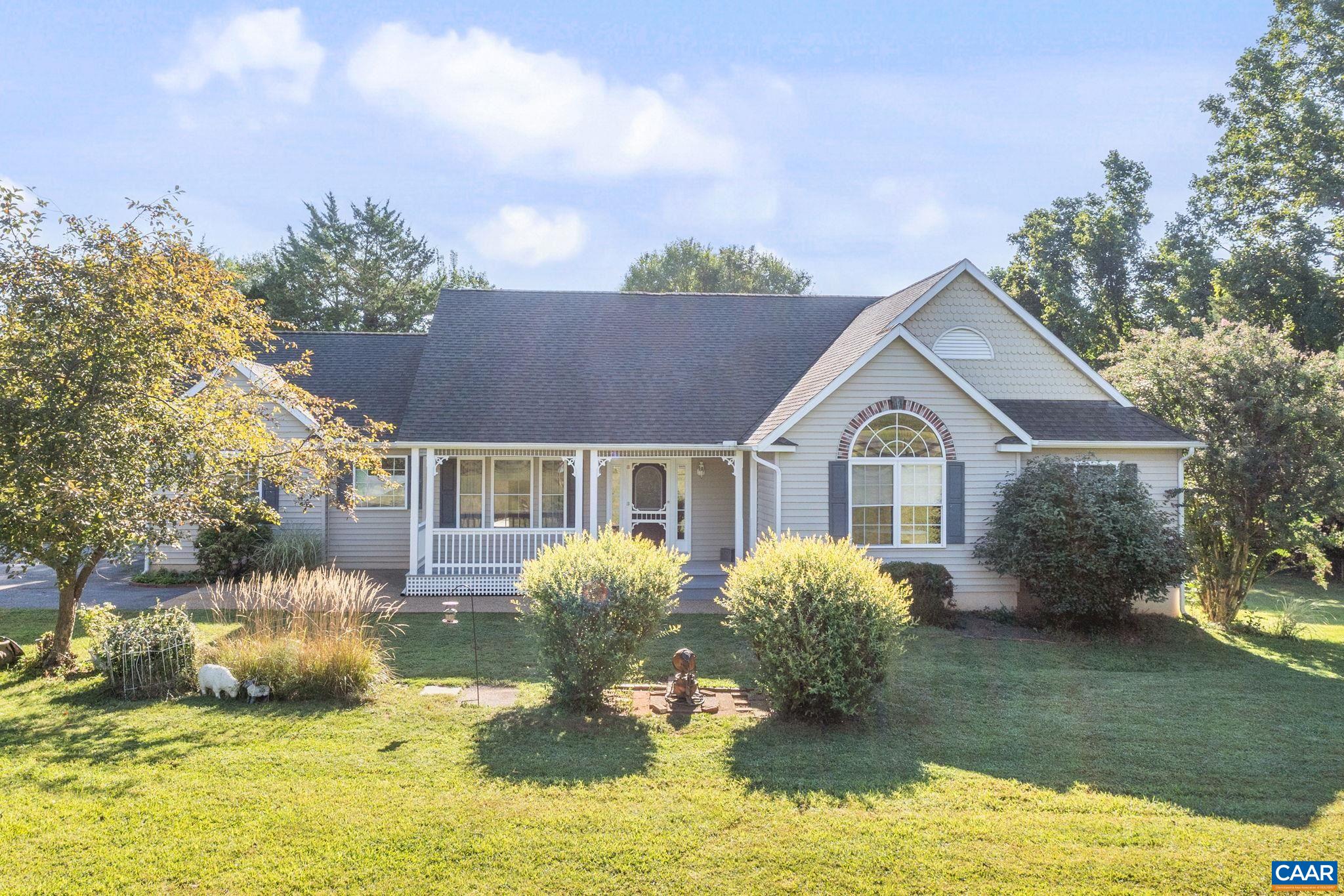 Fantastic Location & Beautiful One-Level Living on Over 2 Acres! Just minutes from Charlottesville, UVA, shopping, top-rated schools, and dining, this one owner home offers the perfect combination of privacy & convenience. Nestled on a gorgeous, nearly level 2+ acre lot, enjoy a peaceful natural setting with room to relax, garden, or play. Inside, a bright and open floor plan welcomes you with abundant windows and natural light. The spacious living room features built-in shelves and a cozy fireplace, offering views of the private backyard. The well-appointed kitchen includes a breakfast nook, while the formal dining room is perfect for entertaining. The main-level primary suite includes a walk-in closet and private ensuite bath. Two additional bedrooms and a home office provide flexibility and functionality,all on the main level! The finished terrace level expands your living space with a large family room, kitchenette, dining area, and a bonus room with a closet, ideal for a guest suite, in-law suite, or additional office.  Additional features include an attached 2-car garage and a beautiful, usable lot perfect for enjoying the outdoors. Don't miss this rare opportunity for one-level living in a peaceful yet convenient location.