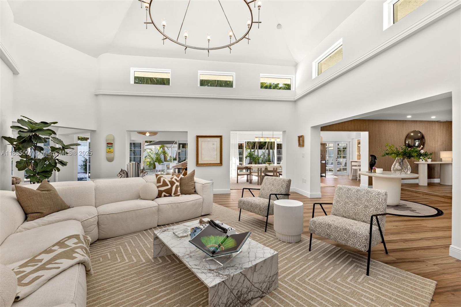 This is truly a unique home with the "WOW!!" factor as soon as you walk in! Beautiful and private  oversize backyard! Great spaces for family living with a section of the home that has a bedroom, den and full bath that is perfect for guests, in-laws or older kids. All new kitchen! All impact glass throughout! New impact front door and all impact glass throughout! New driveway! New metal fence! Three new water heaters and HVAC! Beautiful new curtains, plantations shutters and cool accent wallpaper throughout!  Salt water heated pool! Exterior completely painted in October. Beautifully landscaped and automatic exterior lighting throughout! Brand new metal fence! EV charging station! KB Beach Club membership included!
Oversized 9515 corner lot and almost 4000 sqft interior space!