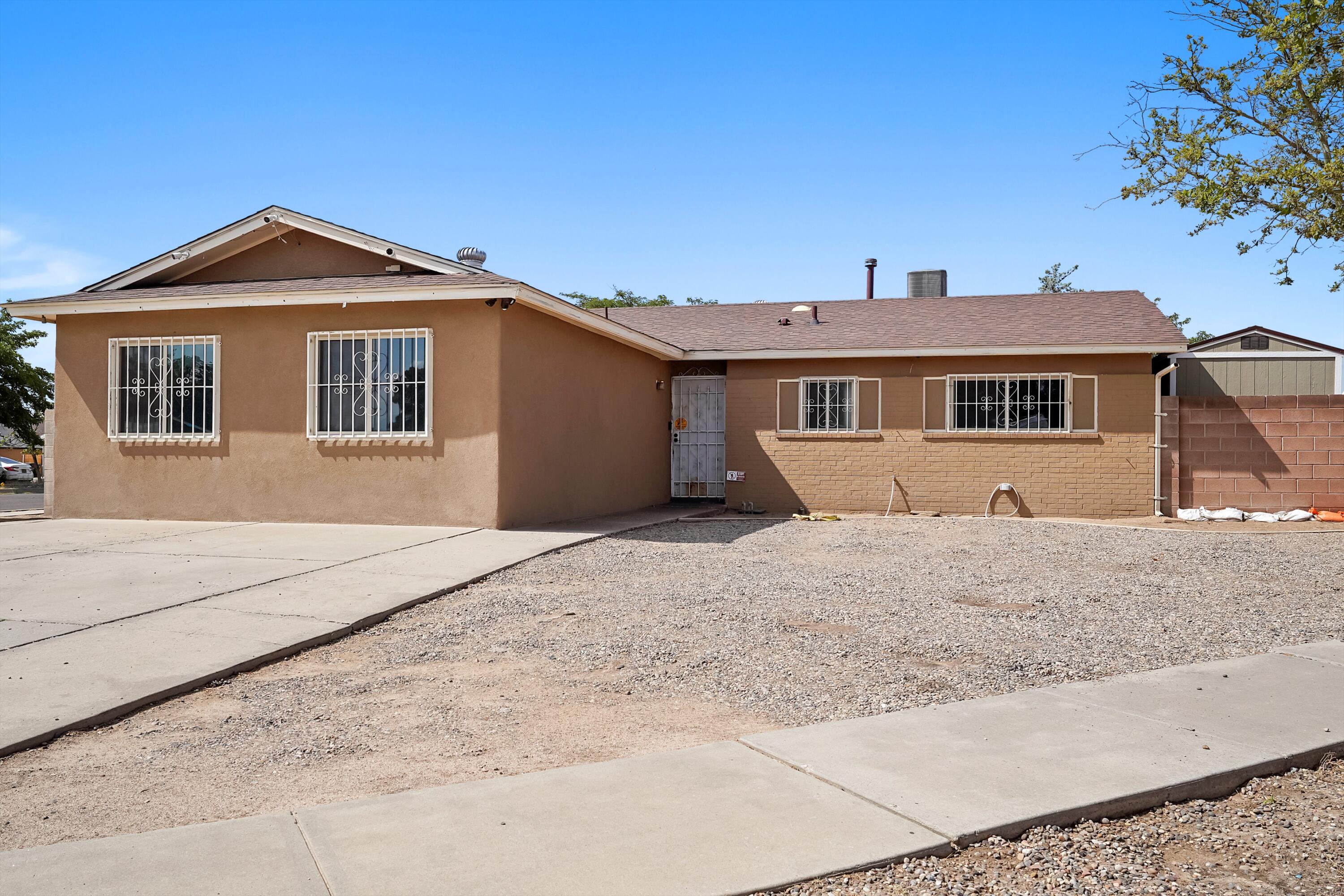 Up to 1% of loan amount in closing costs assistance with use of preferred lender, eligible for closing costs or rate Buy-down! Welcome to this charming home! Situated on a spacious 0.2-acre corner lot, there's plenty of room for parking plus convenient side gate access. This 1,600 sq. ft. residence features 3 bedrooms and 2 bathrooms. The garage has been thoughtfully converted into a comfortable living space with both heating and cooling.Recent updates include a new roof in 2021, along with windows, stucco, and a refrigerated air system replaced in 2020.In the backyard, enjoy a 20X12 gazebo perfect for creating your dream outdoor kitchen, a dedicated dog run, and a stucco storage shed.