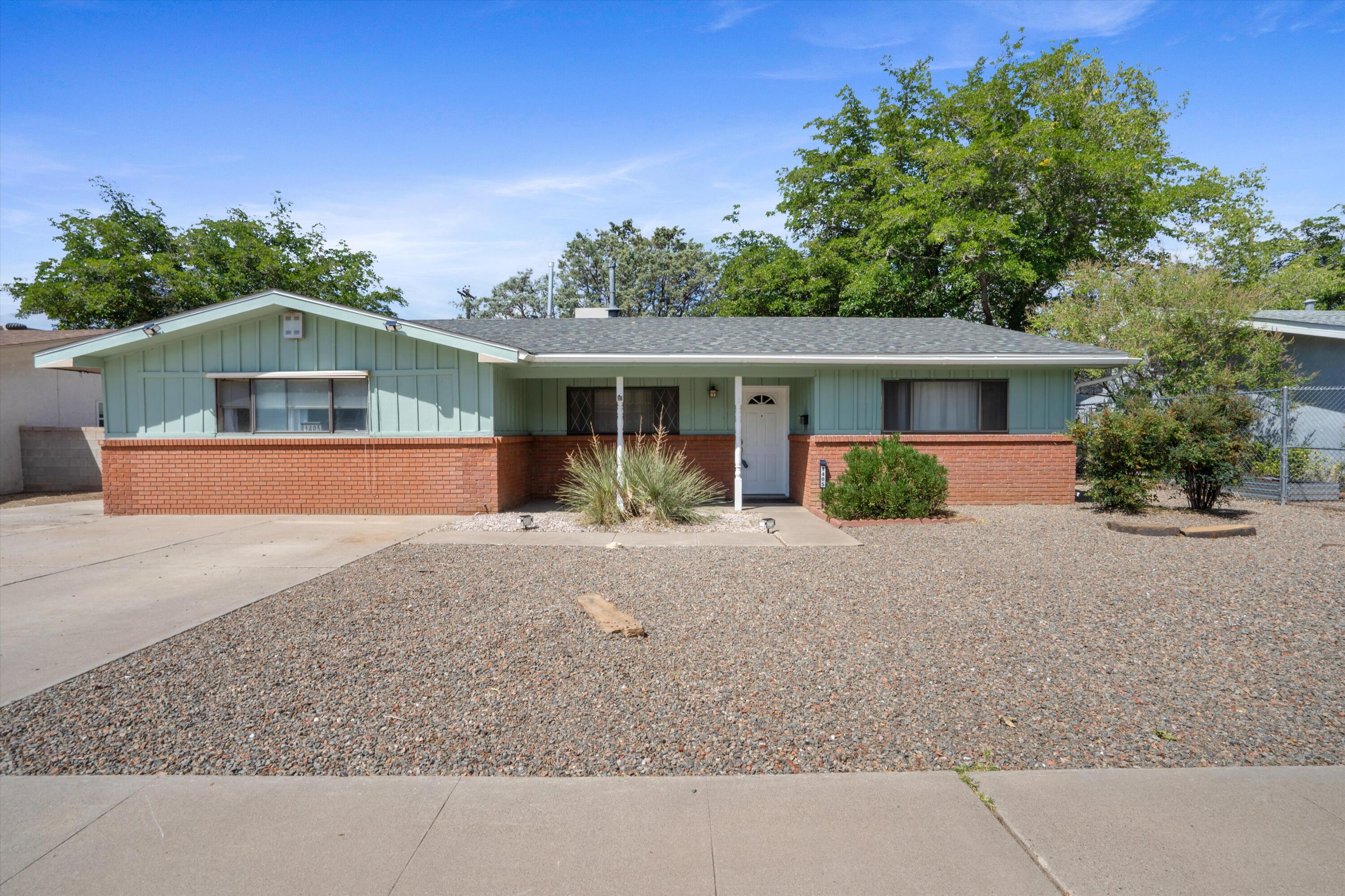 Welcome to this spacious 2,050 sq. ft. home in Albuquerque's desirable Northeast Heights. Lovingly cared for by the same owner for the past 28 years, this property offers comfort, convenience, and plenty of room to enjoy. Featuring 3 bedrooms and 2 bathrooms, the home has been thoughtfully maintained with recent updates, including a newer swamp cooler, heater, and water heater.Inside, you'll appreciate the no-carpet flooring throughout, making upkeep simple for those who prefer low-maintenance living. A large converted garage provides additional living space--perfect for a family room, home office, or hobby area.Step outside to the shady backyard, an inviting retreat for relaxing afternoons or gatherings with friends. you'll be close to shopping, dining, and schools.