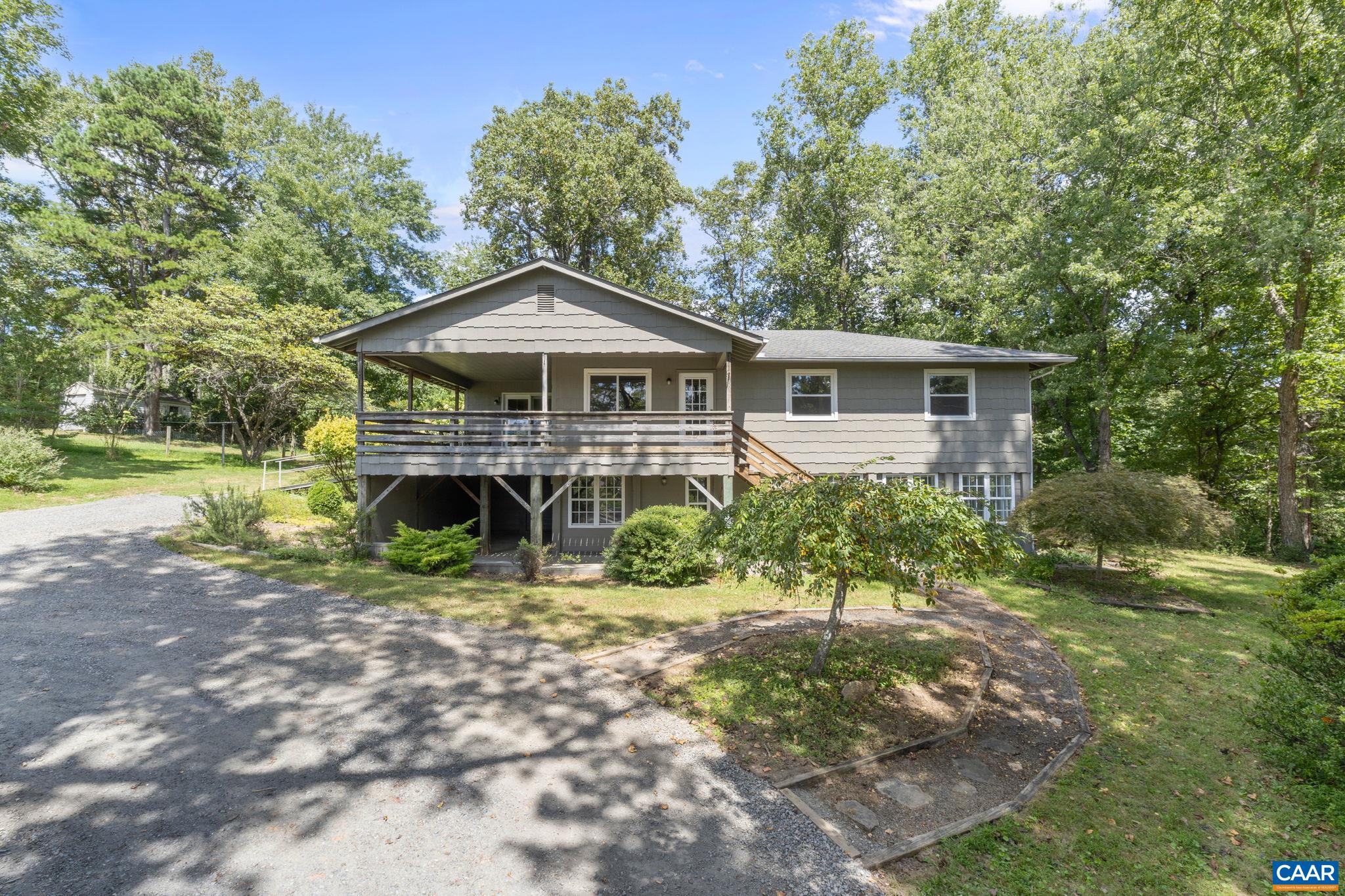 OPEN SATURDAY 10/18 FROM 1-3 PM. This home boasts breathtaking views of some of the region’s most beautiful mountains and is situated next to Hazy Mountain Vineyard on an expansive 4.35-acre property. The residence has undergone extensive updates, including the installation of dual-zone heat pumps in 2023, new flooring throughout, and fresh paint, contributing to a modern and inviting atmosphere. The kitchen is enhanced by a greenhouse window, providing a convenient space to grow fresh herbs within arm’s reach. The family room is filled with natural light, offering serene woodland views, recessed lighting, and built-in speakers for an elevated living experience. For those who like to garden this home offers 2 acres of open south facing, gently sloping pasture, a deep well hand pump in the yard that provides water without electricity, and an 8’x16’ garden shed. GPS mapping will take you to the wrong driveway.  Look for the For Sale sign. That is the correct driveway