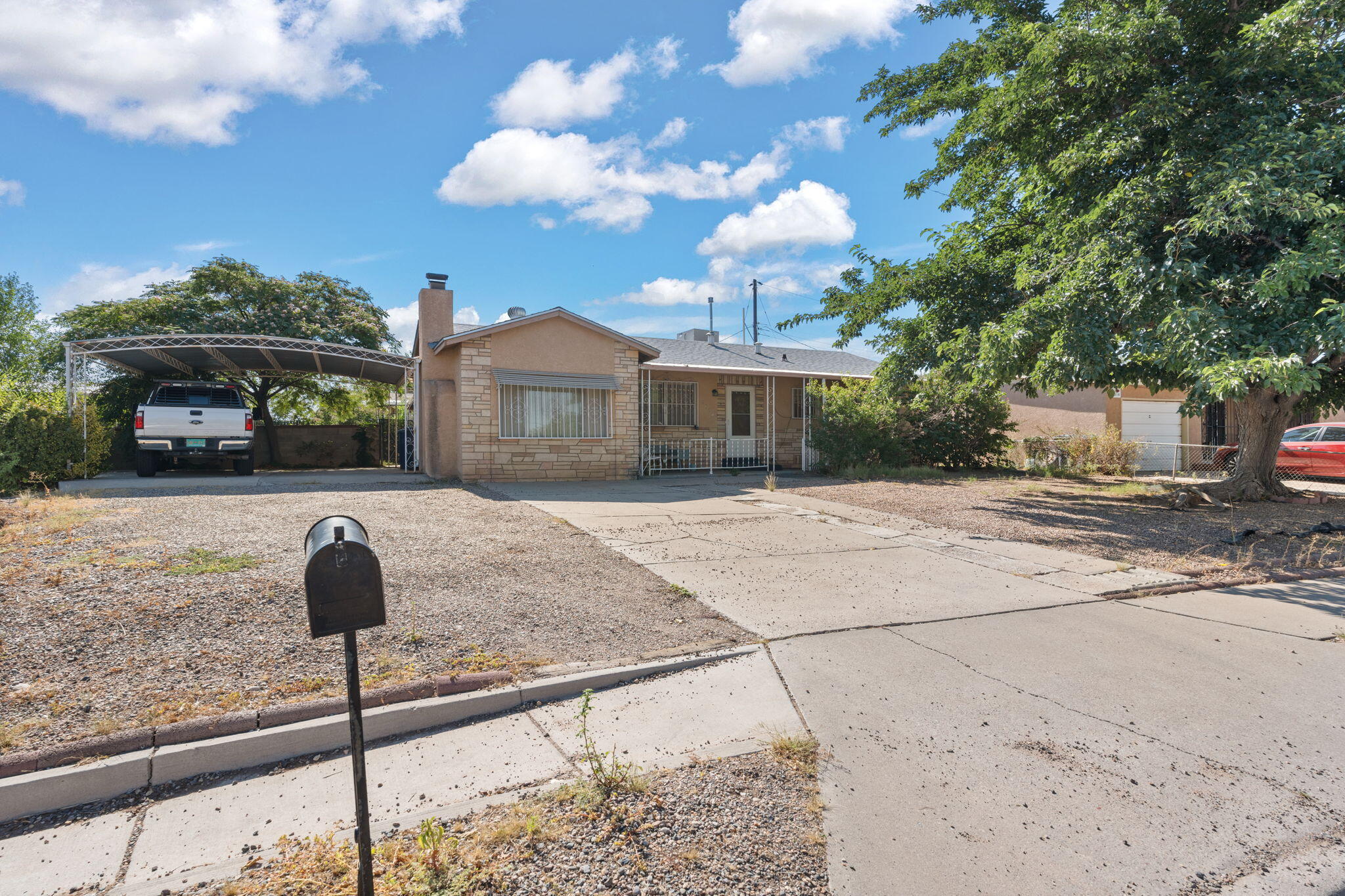 This charming 3-bed, 1.5-bath home in Albuquerque offers a fantastic investment opportunity with plenty of potential. Features include a cozy wood-burning fireplace and a covered front porch, perfect for enjoying the outdoors. Located in a sought-after area, this property is ready for updates to maximize its value. With a bit of TLC, this home could shine and provide great returns. Don't miss out on this prime location with endless possibilities for improvement.