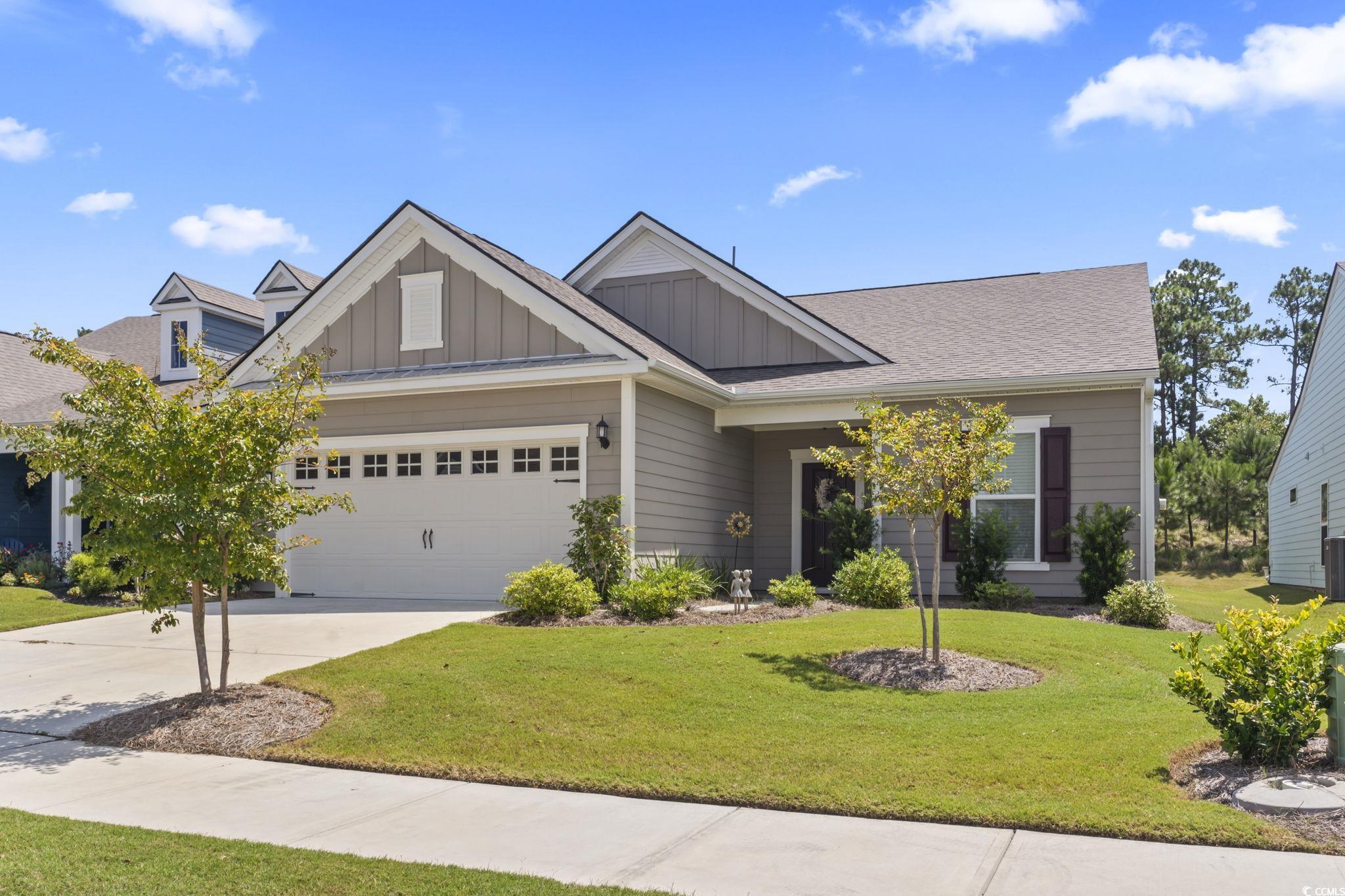 Welcome to Del Webb, the premier 55+ community in the heart of Myrtle Beach! This stunning Martin Ray model features 3 bedrooms, 2 bathrooms, and an oversized screened in lanai with a patio, perfectly blending style, comfort, and functionality. As you enter through the foyer, a cozy study with French doors sits to your right which is ideal for a home office or library. The open concept family room and gourmet kitchen serve as the heart of the home, highlighted by white cabinetry, a custom backsplash, high-end stainless steel appliances including a gas stove, quartz countertops and a custom pantry. A large breakfast bar and spacious dining area make this the perfect space for entertaining. The primary suite, located at the back of the home, boasts tray ceilings, a spa like ensuite with a custom tiled walk-in shower, double vanities, solid-surface counters, and a generous walk-in closet. Just outside the suite, you’ll find a laundry room with custom cabinetry for added convenience. On the opposite side of the home, two additional bedrooms with large closets share a full bathroom. A handy drop zone leads directly to the oversized two-car garage. Step outside to your expansive screened in lanai and patio which is ideal for relaxing, grilling, or hosting friends in your private backyard. Additional upgrades include luxury vinyl plank flooring throughout the main living areas, upgraded lighting and ceiling fans, and all appliances, including the washer and dryer and much more!This home also runs on natural gas for added efficiency. Del Webb’s amenities are unmatched, offering a vibrant, active lifestyle. Residents enjoy daily activities, monthly events, and access to the Amenity Center with indoor and outdoor pools, a state-of-the-art fitness center, and sports courts. You’ll also receive membership to the prestigious Grande Dunes Ocean Club, granting exclusive access to the beach and clubhouse. Conveniently located near golf, shopping, hospitals, restaurants, and all that Myrtle Beach has to offer, this home is priced to sell and presents an incredible opportunity in one of the area’s most sought after communities. Don’t miss your chance to make it yours!