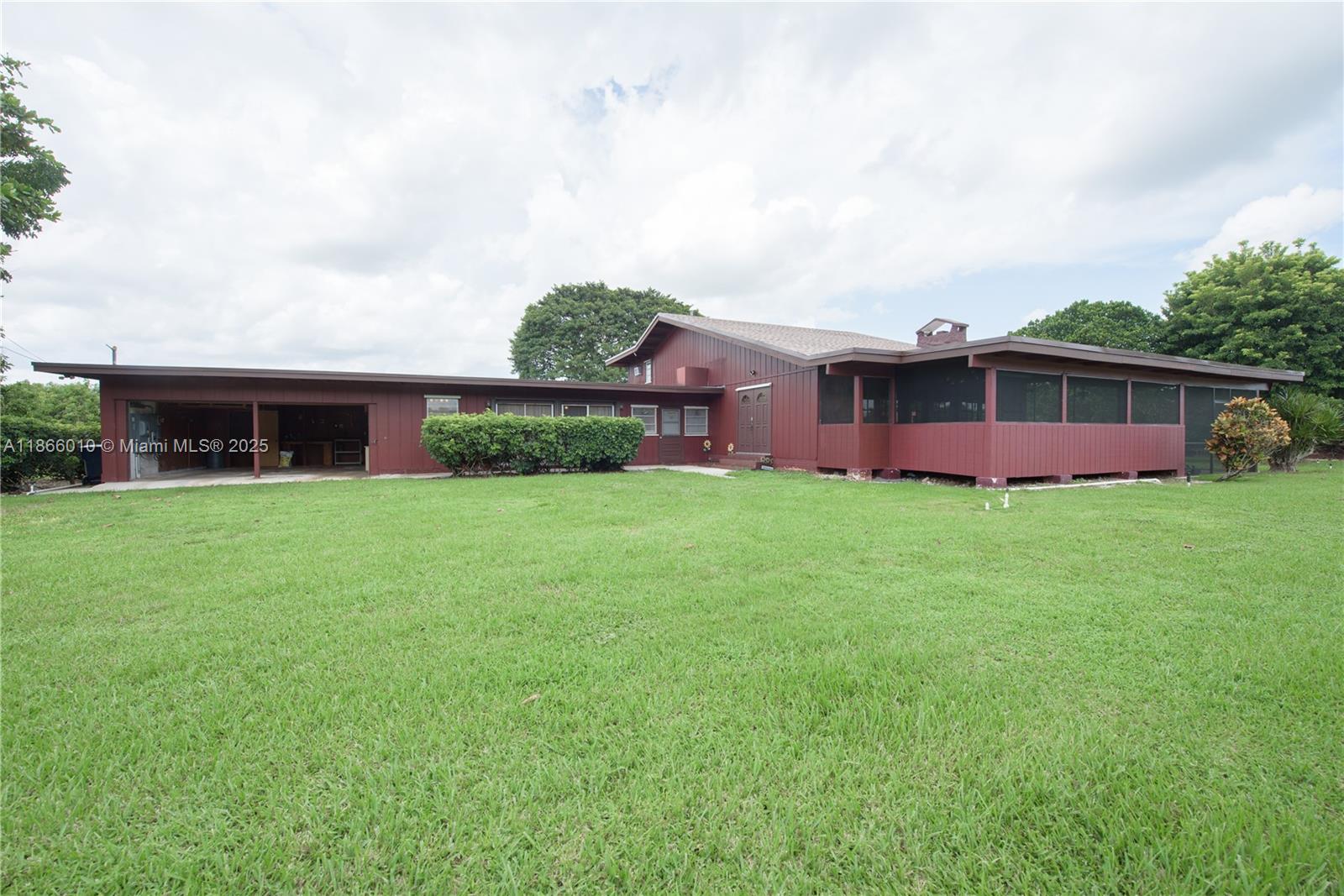 Stunning 4BR/4BA home on 3.75 acres in the Redlands! Includes 2-story attached In-Law Quarters w/ private entrance. Features tongue & groove ceilings, tile, wood & vinyl floors, fan/lights throughout, impact panels, & generator hookup. Gourmet kitchen w/ cooktop, oven, dishwasher, fridge, pantry. Multiple living areas, decorative fireplace, French doors, & bug-screened patio. Upstairs suite w/ Roman tub, dual sinks, 2 closets. In-law quarters w/ kitchen, walk-in closet, full bath, & new A/C. Barn fits 3 cars-2 open, 1 enclosed. 2-car garage, 2 meters, water softener, well pump, sprinklers, fruit trees.  PROOF OF FUNDS AND/OR PRE-APPROVAL LETTER REQUIRED PRIOR TO SCHEDULING A SHOWING OF THE PROPERTY!!