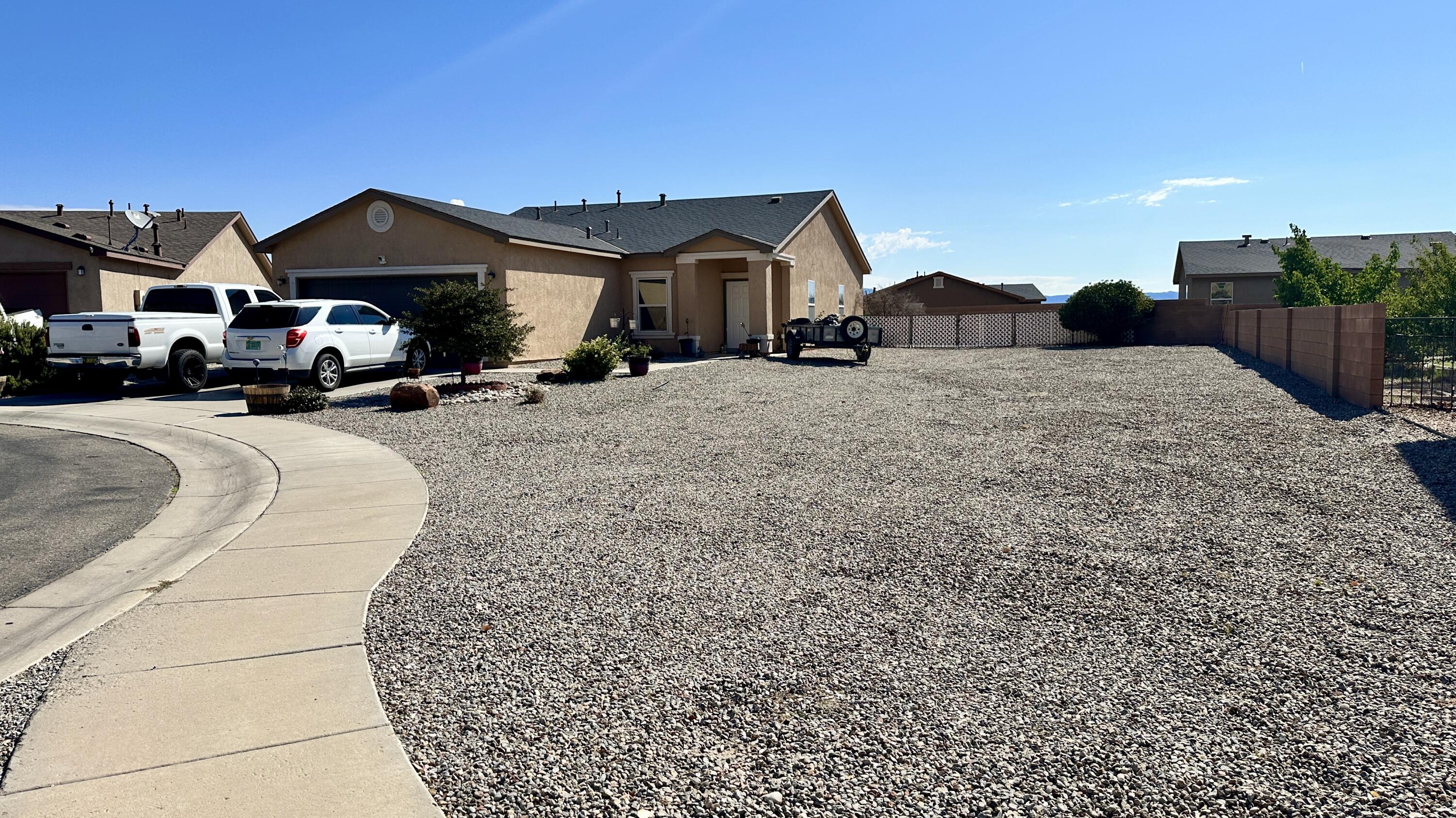Welcome home to one of the largest lots in the neighborhood at 0.25 acres with possible backyard access and amazing unobstructed views. This 1,460 square foot home features 3 bedrooms, 2 full bathrooms, and brand new flooring throughout. Enjoy year-round comfort with refrigerated air and an open, functional floor plan. Located in a gated community that offers fantastic amenities, including a pool, park, and playgrounds. Conveniently close to shopping, schools, and entertainment. This home is move-in ready and eligible for programs with as little as zero down. Schedule your showing today.