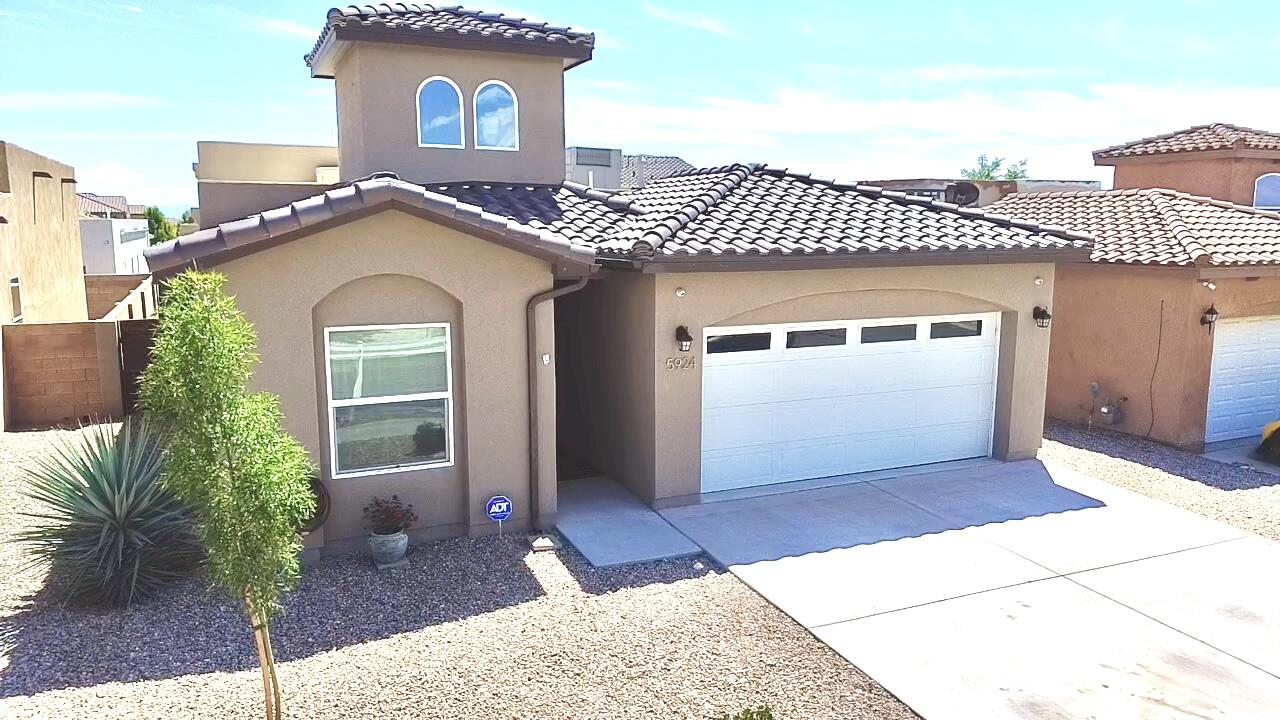 Welcome to modern-day luxury style home.  This home has many amenities and features Spanish tile roof, durable synthetic stucco, refrigerated air, finished garage, low-maintenance and beautiful tile flooring, stack stone accents, quartz countertops, and relaxing gas fireplace.