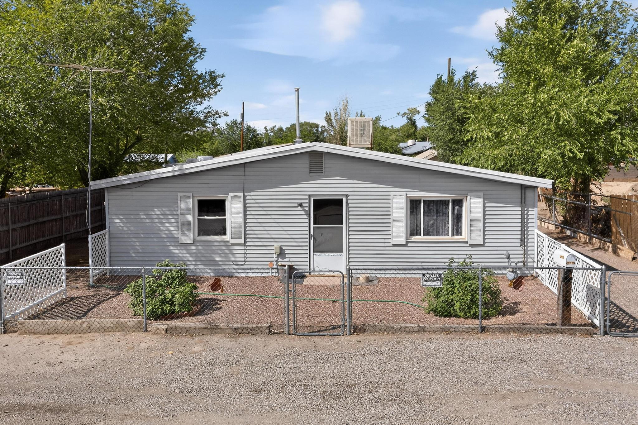A charming single-story home full of potential and ready for your personal touch. This home features easy-care tile flooring in the main living areas and a spacious family room ideal for everyday living or entertaining. With three well-sized bedrooms and direct backyard access, it's a true blank slate to create the lifestyle you envision. The large lot offers space to park your RV and plenty of outdoor space for gatherings, gardening, or relaxing under New Mexico's skies. Conveniently located in Southwest Albuquerque, close to shopping and dining, this versatile property is perfect for first-time buyers, investors, or anyone seeking single-level living.