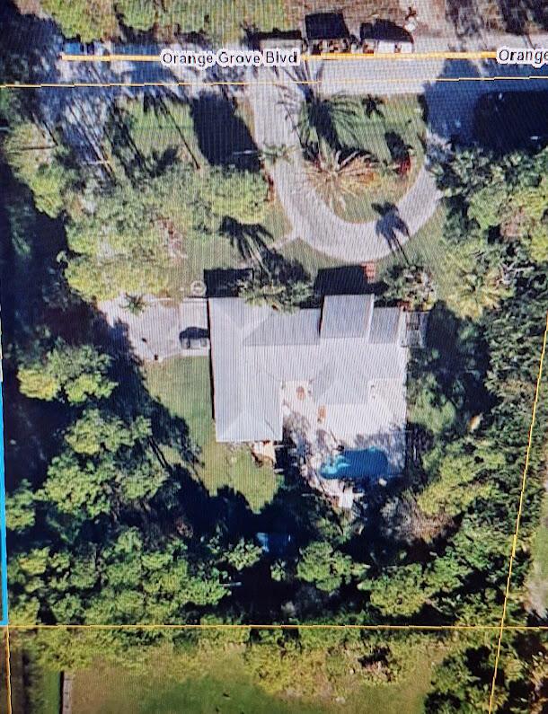 Photo 25 of home located at 13616 Orange Grove Boulevard, The Acreage FL