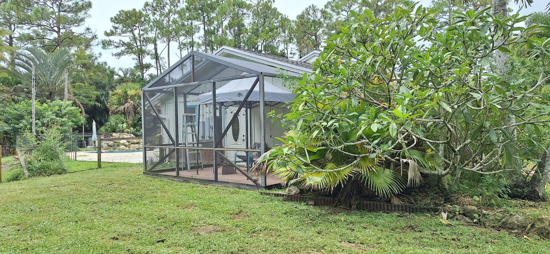 Photo 28 of home located at 13616 Orange Grove Boulevard, The Acreage FL