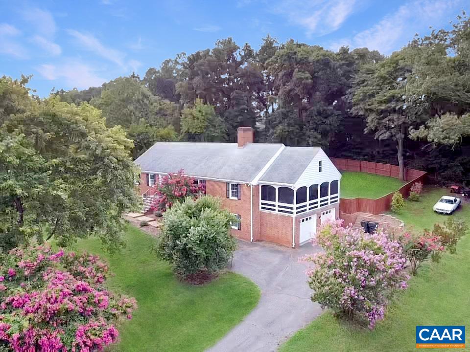 Desirable and modern Northfields property on a great private lot.  Spectacular oak hardwood floors recently refinished and look stunning! Updated and modern full bathrooms on main level with first level primary/owner suite.  Large open living room and dining room that open to a beautiful covered screen porch with ceiling fans.  Large eat in kitchen with fireplace and private views of the back yard.  Cherry cabinets, granite counter tops and stainless steel appliances with option space and connection for washer/dryer.  Basement apartment features separate entry, bedroom and full kitchen.  Full bathroom and large home office or recreation/flex space in basement as well.  Easy access walk up attic. Over 900sf of unfinished space for storage.  Oversized attached garage with workshop space.  Large backyard is fenced and private. Large shed and whole house generator on the property as well.