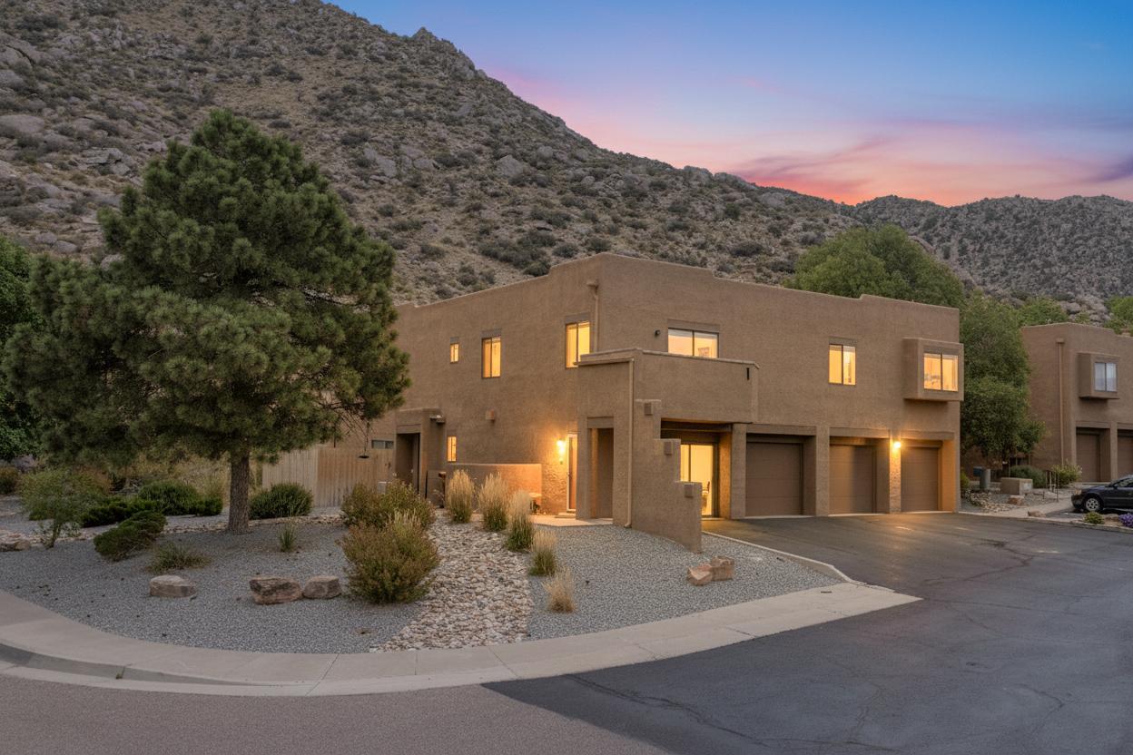 Discover this charming condo nestled in the scenic foothills near the Sandia Mountains, offering the perfect blend of comfort and convenience. Step outside to enjoy direct access to some of Albuquerque's best hiking and biking trails, or relax inside where thoughtful updates create a warm and inviting atmosphere. The cozy kitchen features beautiful granite countertops, while the newly renovated bathrooms add a fresh, modern touch. The HOA covers water, sewer, exterior maintenance, common areas, making for an easy, low-maintenance lifestyle. With its prime location and key updates (2011 HVAC, as well as the roof and stucco refreshed in the past 5 years, this condo is an ideal retreat for outdoor enthusiasts or anyone seeking a relaxed foothills lifestyle. This could be your ABQ Dream Home!