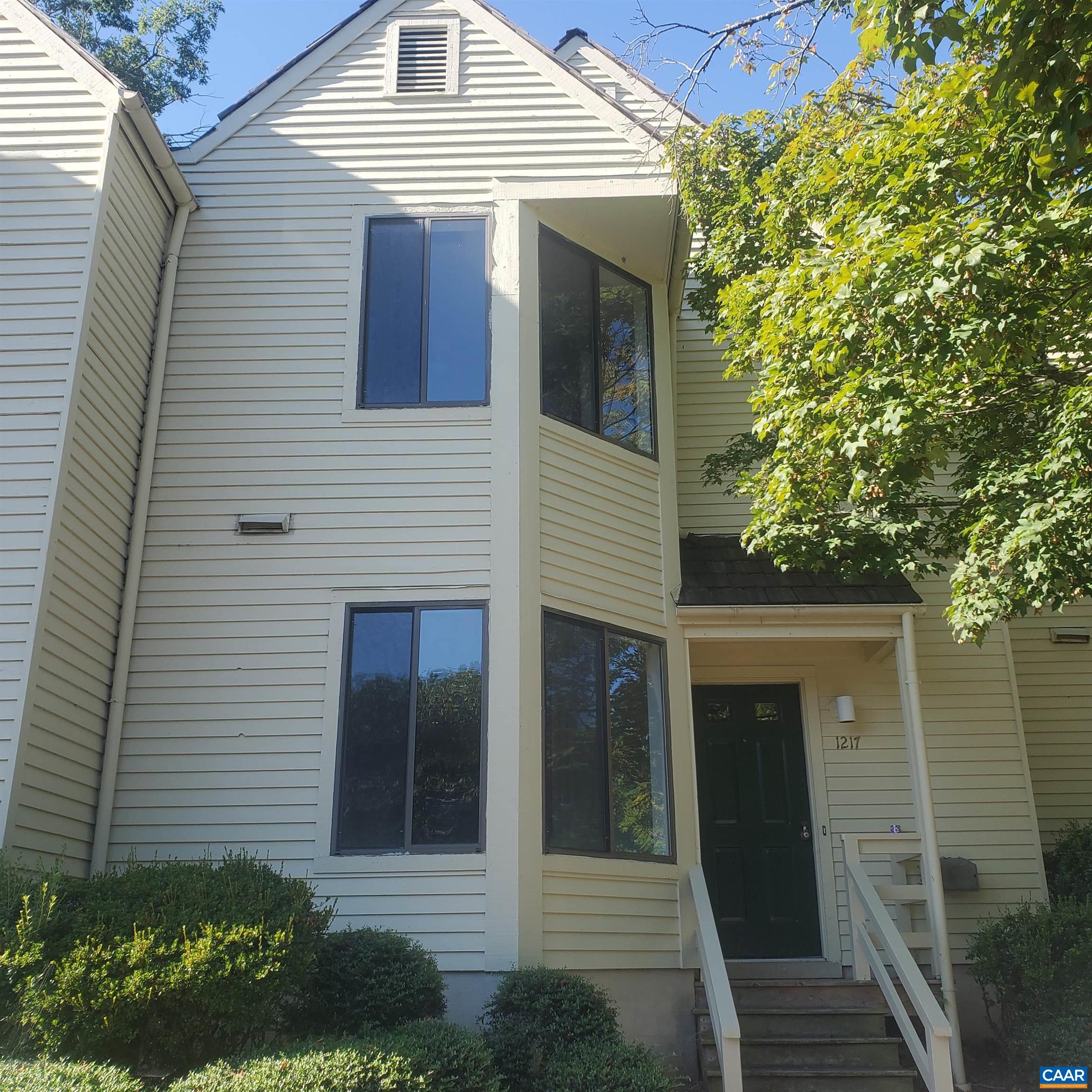 New listing with 3 bedrooms in sought after River Run with its attached community pool, public golf course, fitness trails and Rivanna river walks. Large, eat in kitchen, cosy living room with new carpet and wood burning fireplace.  Tiled hallway with half bath.  Upstairs has 3 good sized bedrooms, and full bath. The back yard is magical. Fully fenced and totally private with endless possibilities.    There is also an attached tool or bicycle shed. Complete new water piping installed 2025.  Great opportunity and being sold as is.