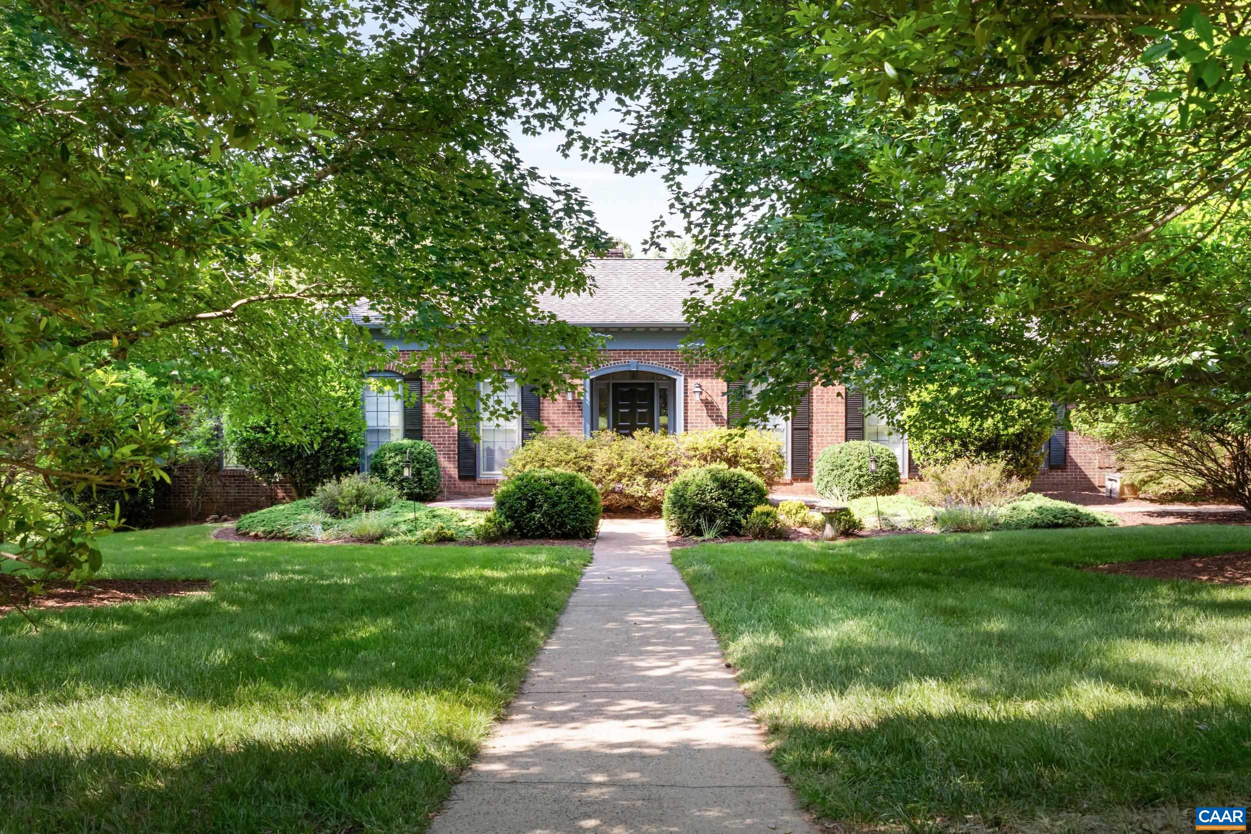 Privacy and peace in a lovely walkable neighborhood of nice homes on large manageable parcels, on a cul de sac. 631 Montei Dr is a wonderful home on a beautifully-landscaped 2 acres, with wildlife, mature trees, and plenty of area/setting for edible growing, if desired. Built by well-respected local builder, Ollie Fitzgerald, the home is a brick single level on a full walk-out basement. Incredibly well-built and maintained by the 2 owners who've called the house their home. Baths have been updated, mechanicals & appliances are all within 10 years of age. The terrace level features good light & great, open storage.  There's a workshop, studio/game room/office and 3rd full bath, plus a second family room with fireplace.There is an attached, oversized garage on the main level at the kitchen. Fairgrove neighborhood is a series of three streets (Montei is one of them) off of Bleak House Rd in Earlysville, close to many recreation options... Rivanna River for fishing/rowing/kayaking, Ivy Creek Natural Area & Chris Greene Lake, and 3 or 4 wineries/vineyards are near by. The neighborhood is off the beaten path, but a moments drive to shopping at Hollymead and Stonefield. No HOA; Natural Gas is available; See FEATURES, Floorplan, 3D Tour.