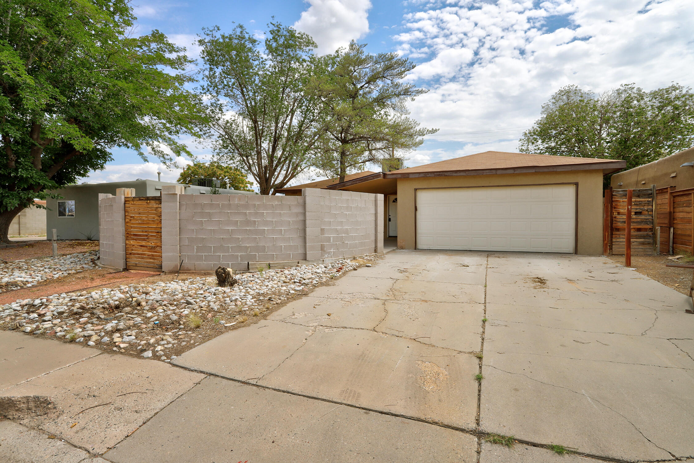 Beautifully Updated 3-Bedroom, 2-Bath Home with 2-Car Garage! This move-in-ready gem features a brand new furnace and refrigerated air system for year-round comfort. Enjoy a fully updated kitchen with Corian countertops, modern cabinets, stainless steel appliances, and stylish fixtures. Both bathrooms have been thoughtfully remodeled with new vanities, contemporary tile surrounds, and updated fixtures. Fresh interior paint and updated flooring flow throughout the home, creating a clean, modern feel. The spacious backyard offers alley access and endless potential for your personal touch. Conveniently located with quick access to I-40. Add this one to your must see list.