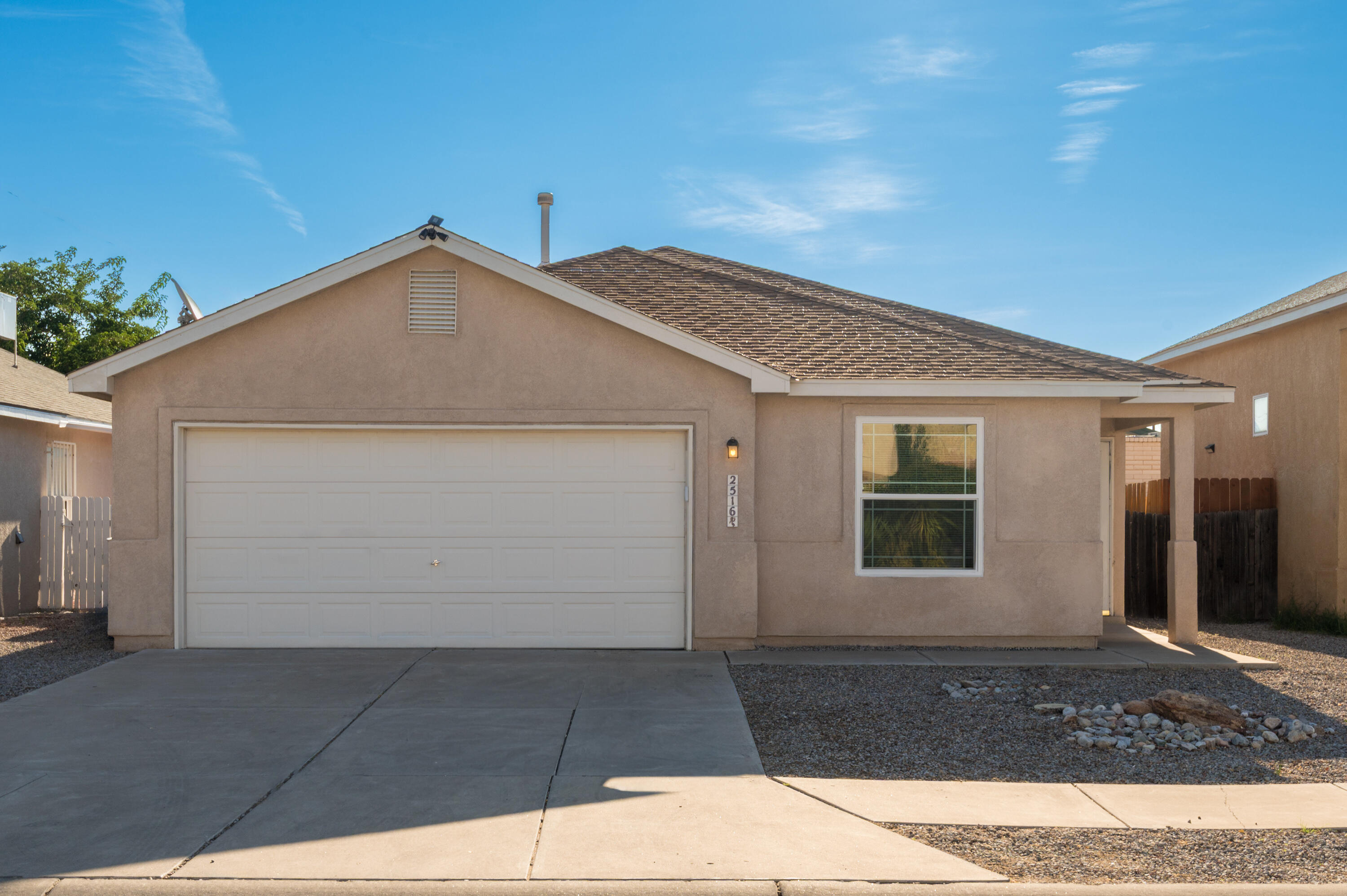 Welcome to 2516 Maiden Grass Rd NW! This beautifully updated 3 bed, 2 full bath home offers 1,229 sq ft of inviting living space. Inside you'll find new flooring, vaulted ceilings, and a bright, open layout that feels spacious and welcoming. The eat-in kitchen is perfect for everyday meals and entertaining, while the primary suite provides comfort with its own private bath. Step outside to enjoy the backyard patio and low-maintenance xeriscaped yard. A 2-car garage adds convenience and storage. Ideally located near I-40 for an easy commute to downtown or the East Side, plus close to shopping, dining, and more. Move-in ready and waiting for you to make it your own!