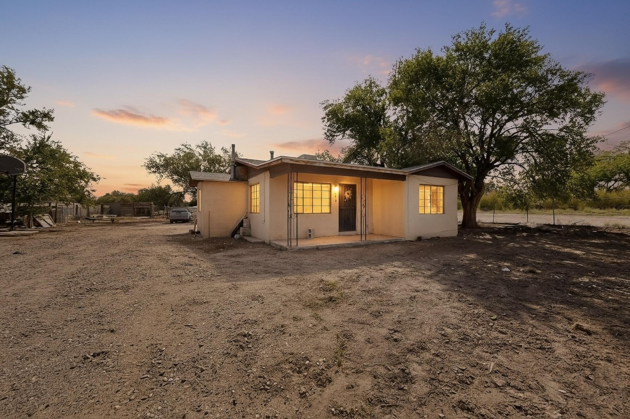 WALK INTO EQUITY, great property available in the agricultural side of the South valley of Albuquerque New Mexico. Featuring a half acre of land, all city utilities, Near Rio Bravo Blvd and Del Rio add sw. OWNER TO OWNER FINANCING AVAILABLE. Home is a 3 bed 1 bath with a newer roof, lots of yard space, fully fenced, and possible mgrcd rights. DO NOT MISS OUT! Schedule a viewing