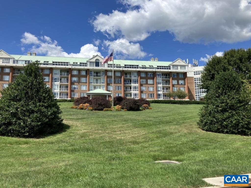 This lovely, elegant condo is ready to be your next home.  It has 2BR, 2BA, and is on the 3rd floor (feels like 4th measuring from ground level!). With gleaming cherry floors and an updated kitchen you will find a warm home here.  The outdoor balcony floor was also recently retiled, and views are lovely.  Life at University Village gives much ease and peace of mind.  There are wonderful amenities provided; library, extra guest rooms if you need the space, a year-round heated pool, fitness rooms, art studio, meeting rooms, and more.  Outside there are lovely walking trails, gardens, outdoor gazebos, etc.  Fine dining is available too in a beautiful setting.  Condo fee covers most of your utilities: electric, HVAC, water, sewer, trash and cable. One of those must see homes!