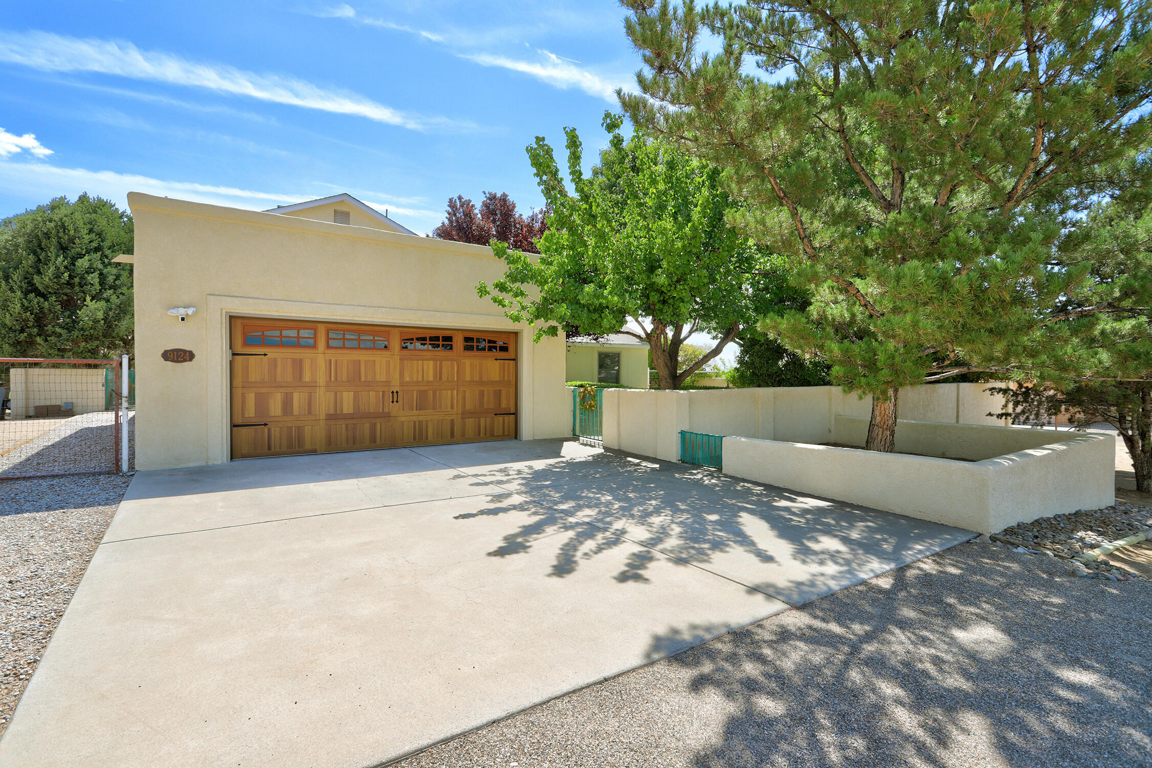 Nestled in NAA., this charming property sits on .89 acres & offers the perfect blend of comfort, space, & views.  With 1988 sq ft. the home features 3 spacious bedrooms, including a private primary suite on its own private level w/breathtaking mountain views, a spa-like bath w/ a jetted tub  & separate shower + its own private view deck. The heart of the home is a light-filled great room w/soaring ceilings & a cozy gas log fireplace, opening to a formal dining area  & a beautifully updated kitchen w/granite countertops & newer appliances.  Step outside to enjoy a covered patio w/mountain views, a grassy courtyard shaded by mature trees, + a  red apple tree.  The large two car garage has room for large vehicles. Back yard is fully pipe fenced & ready for your horse. Newer roof too.
