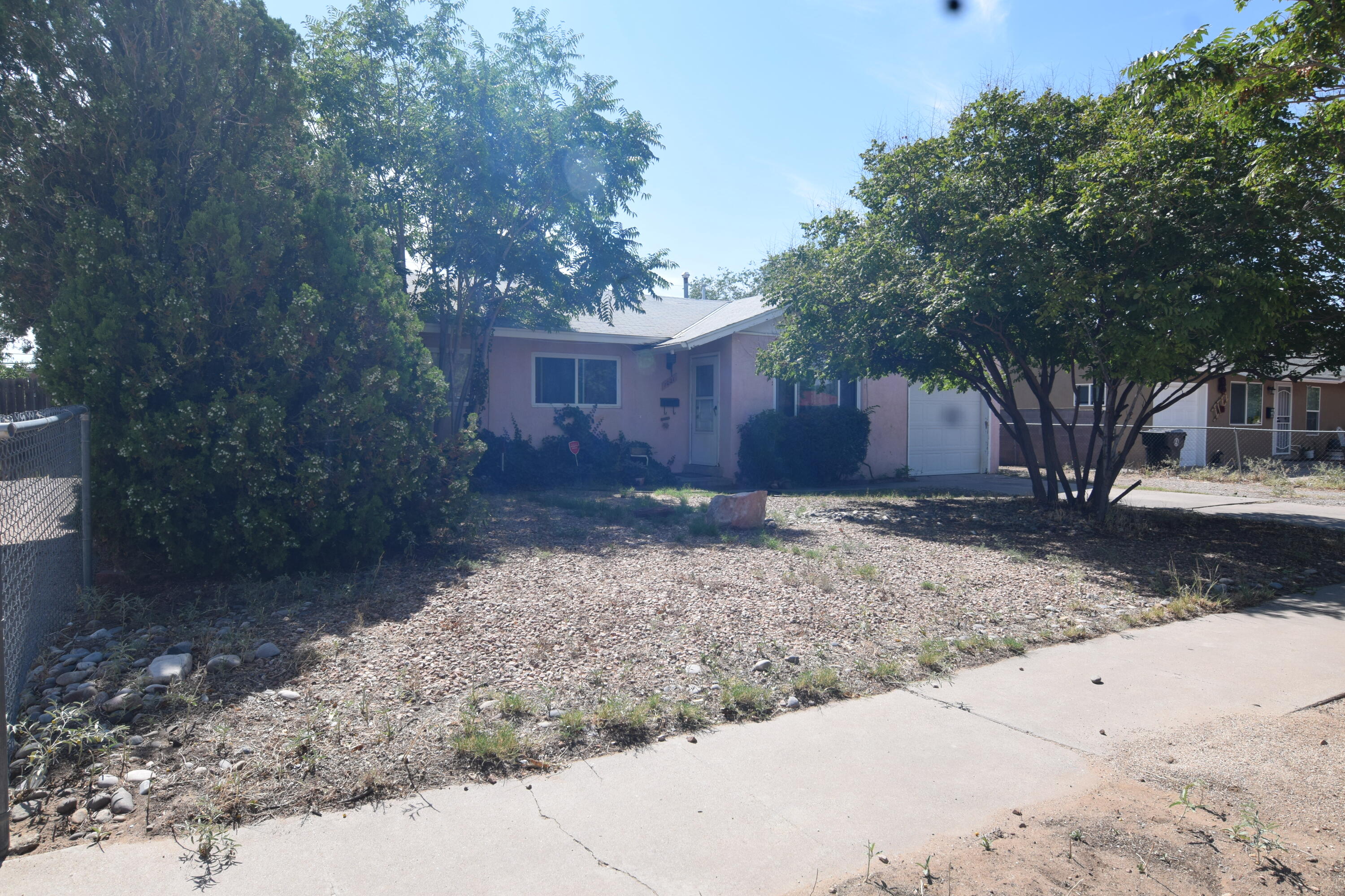 Charming 3 bedroom 1 bath home in an established neighborhood close to I-40, shopping, dining and schools!   Newer furnace and water heater    2 year old evaporative cooler.   Large backyard with dog run!   PNM photovoltaic solar means low electricity bills!      Come take a look!