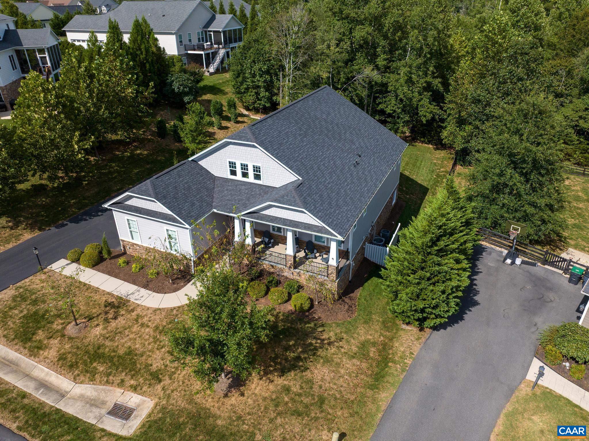 New Buyers get 25% Membership Discount Opportunity!! Discover the perfect blend of comfort & style in this stunning main-level living Glenmore home; tucked away on private cul-de-sac lot. Step inside to find open, spacious rooms filled with natural light- thanks to an abundance of added windows.  At the heart of the home; a striking double sided stone surround fireplace creates a cozy focal point, seamlessly connecting the indoor & outdoor living areas.  Enjoy year-round relaxation on the screened porch; overlooking the peaceful private setting. The main level offers convenience & flow, while the upstairs boasts a huge 4th bedroom, 3rd full bathroom & versatile office/living area- perfect for guests, hobbies or working from home. The unfinished basement is already roughed in for plumbing, offering endless possibilities to expand your living space. With this thoughtful design, modern comforts & private lot, THIS HOME TRULY HAS IT ALL!