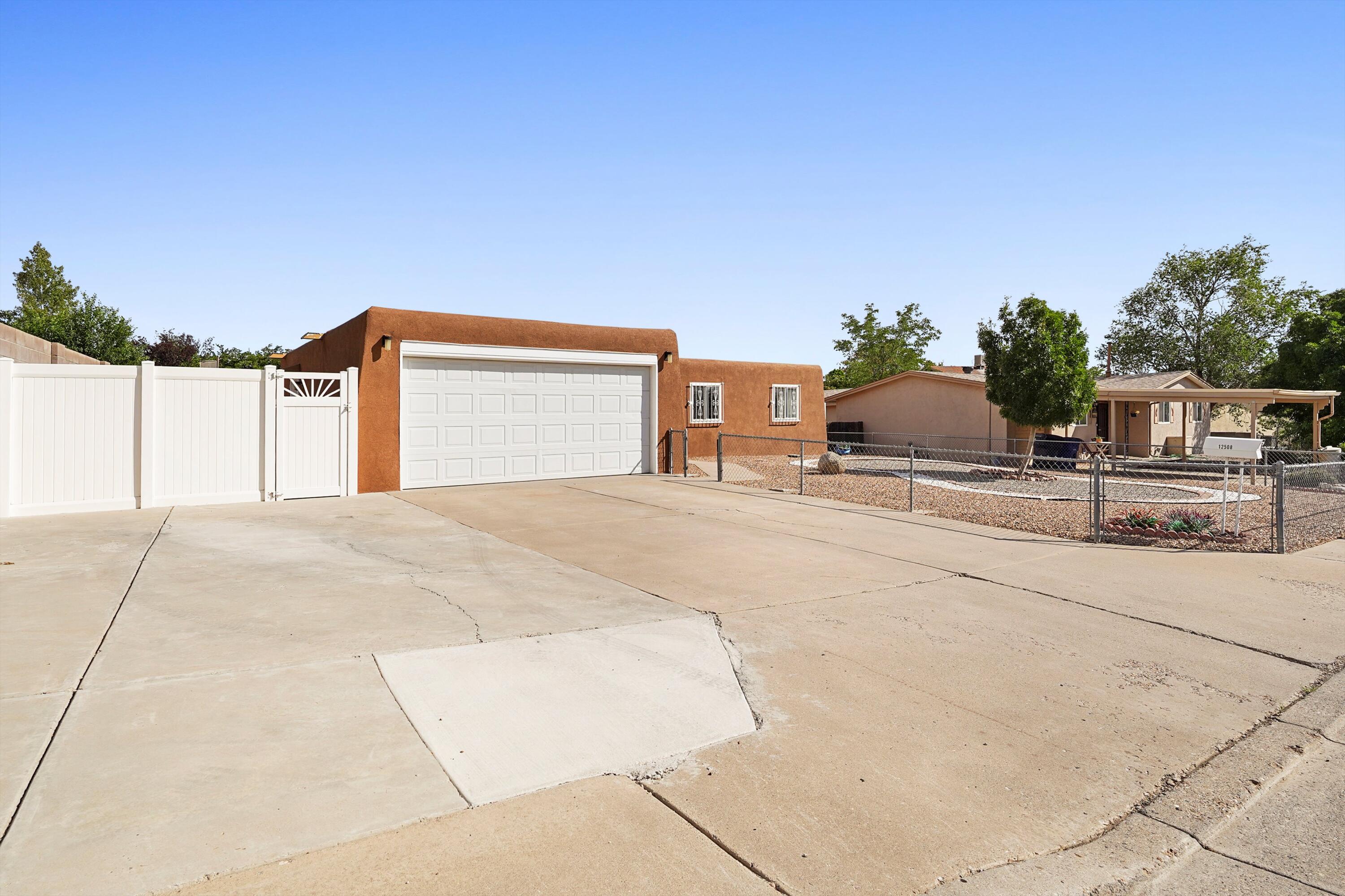 This well maintained and charming home will quickly become a favorite. The kitchen and baths have all been tastefully refreshed. Granite counters attractive bath vanities and surrounds A/C 2018 W/H 2019 Stucco was just completed updated vinyl windows with TPO roof. Large lot with covered patio and grass and storage in the backyard everything else is meticulous low maintenance xeriscape.Large extended driveway pad with back yard access possible and two car garage with work area and extra storage Perfect move in ready gem. Schedule a showing and make this your new home before it's gone.