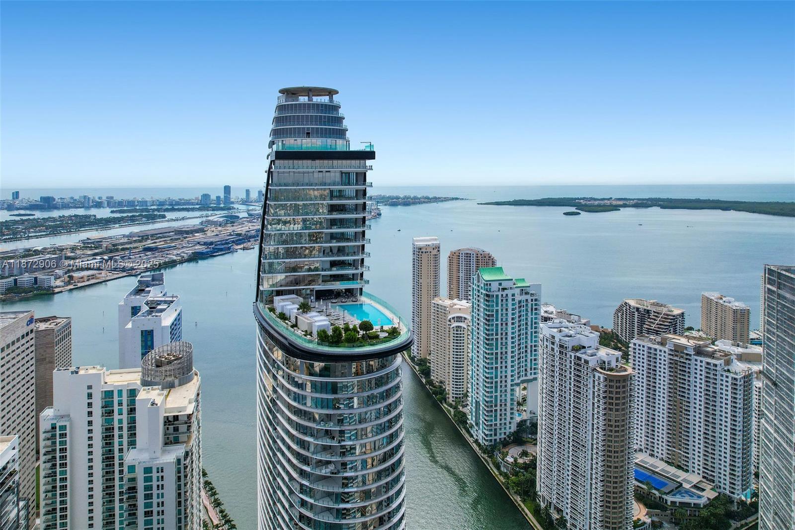 Aston Martin Prestige Signature Penthouse. This Breathtaking, Ultra Luxury, Turnkey One-Story PH is the Epitome of Downtown Miami Brickell Ultra Luxury Living. Featuring over 12,000 s.f. of meticulous, elegant space.  9,000 s.f. of Luxury Interior Living Space encompassing 4 bedrooms, 6 bathrooms, a Staff Room, Fitness Studio, a Dry Bar, a Butler Pantry, and over 3,300 s.f. wraparound terrace with a Private Bradford Pool. Specialty-designed Luxury, Custom-made Furniture, and Artwork adorn this luxury Turnkey Masterpiece. Unparalleled views of the Miami Skyline, the Atlantic Ocean, and Biscayne Bay grace this Gem. Aston Martin Residences features an Art gallery, Infinity Pool, Luxury Spa, Fitness Center, a Butler Service, and a Super Yacht Marina for sophisticated buyers.