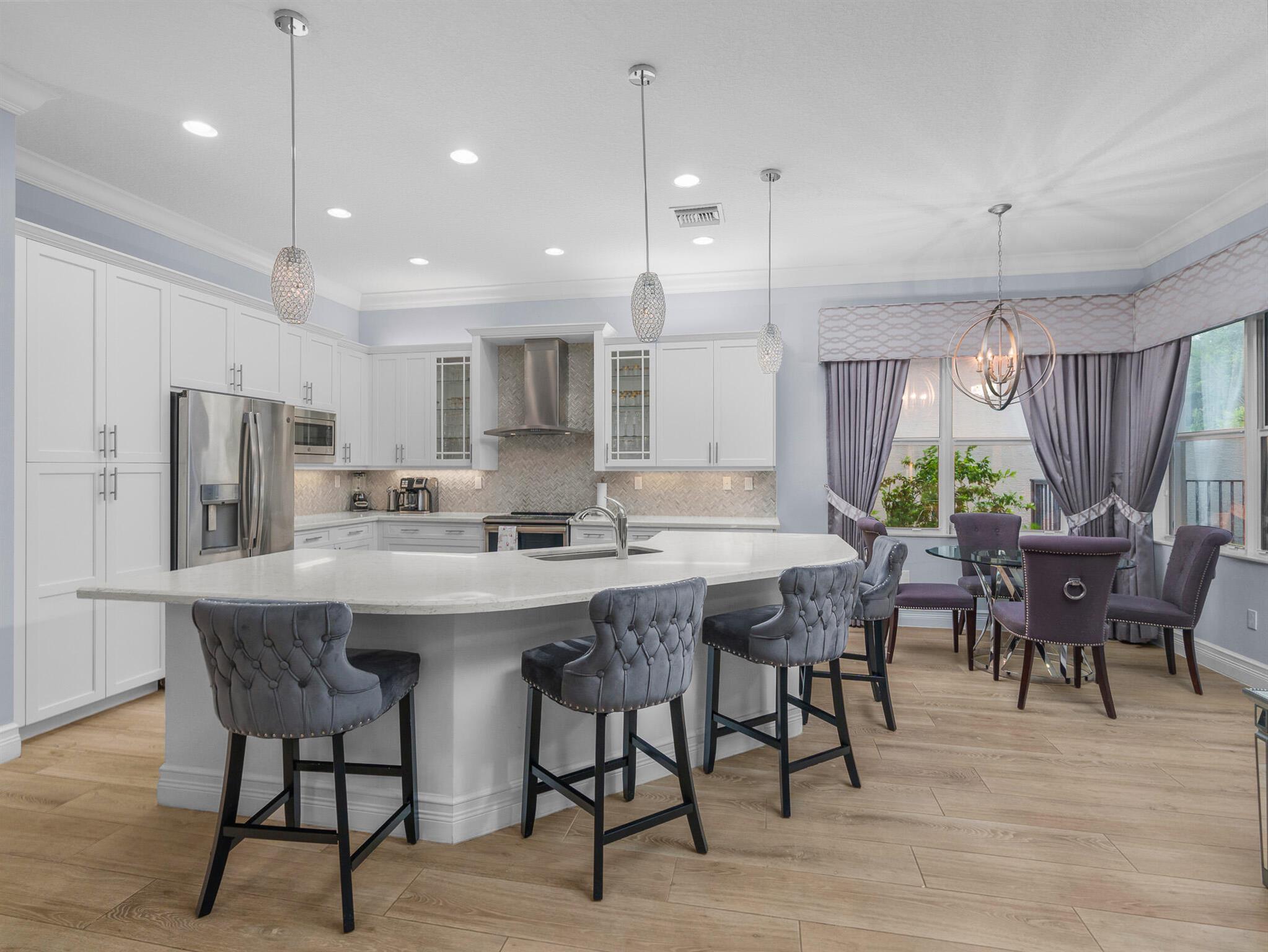 This beautiful custom home  is 3 bedroom 3 full bath + Den or 4th bedroom, 2 car garage, The Bimini model sits on a private lot. Includes impact windows, open floor plan, all custom floors, recessed lights with custom light package and custom trim package . The gourmet kitchen w quartz countertops, custom backsplash, built-in pantry cabinet, stainless steel appliances and under cabinet lighting.  Breakfast area, dining room is like new. The home is being sold as furnished with TVs and all appliances. TV on Patio, heated pool.  New ultra quiet generator with buried LP Tank.  Sleep number bed in master bedroom. Screened Patio and fenced yard. HOA provides Lawn, all garden maintenance, sprinklers basic cable, clubhouse, painting house, cleaning ,driveway Motivated​​‌​​​​‌​​‌‌​‌‌‌​​‌‌​‌‌‌​​‌‌​‌‌‌ seller
