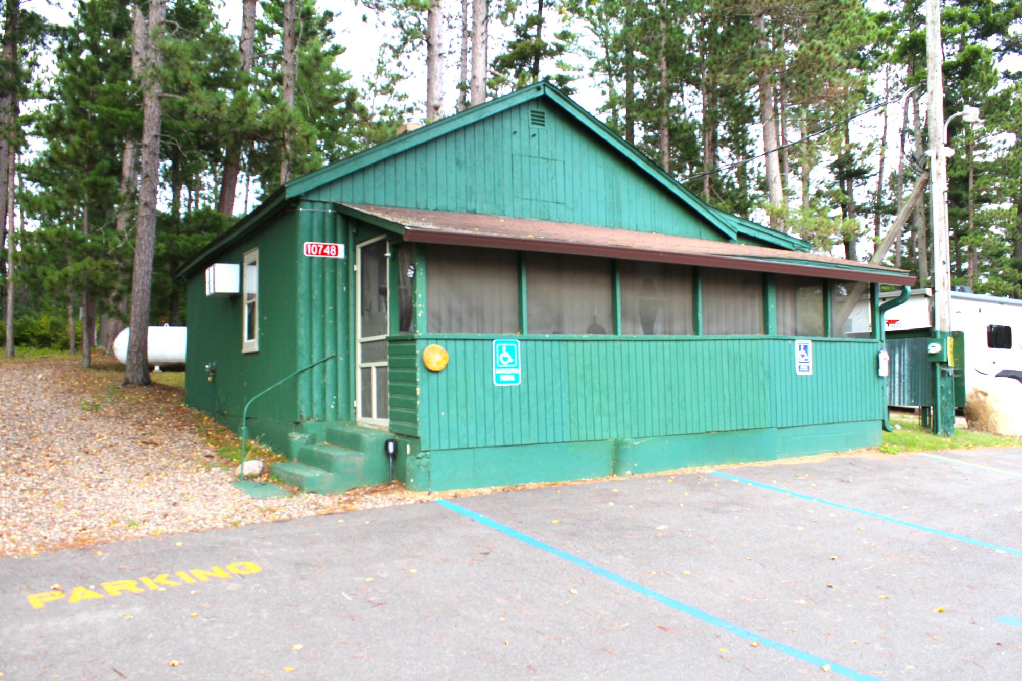 Looking for the perfect getaway in the heart of the Northwoods? Look no further! This beautifully remodeled 2-bedroom, 1-bath year-round condo offers the ideal blend of rustic charm and modern comfort known as the "Musky". Tucked away on the serene shores of Swamp Lake, you’ll enjoy peace and privacy with the convenience of being just a short drive from both Tomahawk and Minocqua. Thoughtfully updated throughout, this condo retains the cozy Northwoods feel while providing the peace of mind that comes with quality renovations. Outdoor enthusiasts will love the location — with ATV and snowmobile trails just steps from your door. Each condo owner has space to install their own dock and enjoys access to the private on-site boat launch, making it easy to enjoy everything the lake has to offer. Don’t miss your chance to own a slice of Northwoods paradise. Schedule your private showing today! All Data approximate, Buyer to verify all data. "Musky" Shared Water frontage.