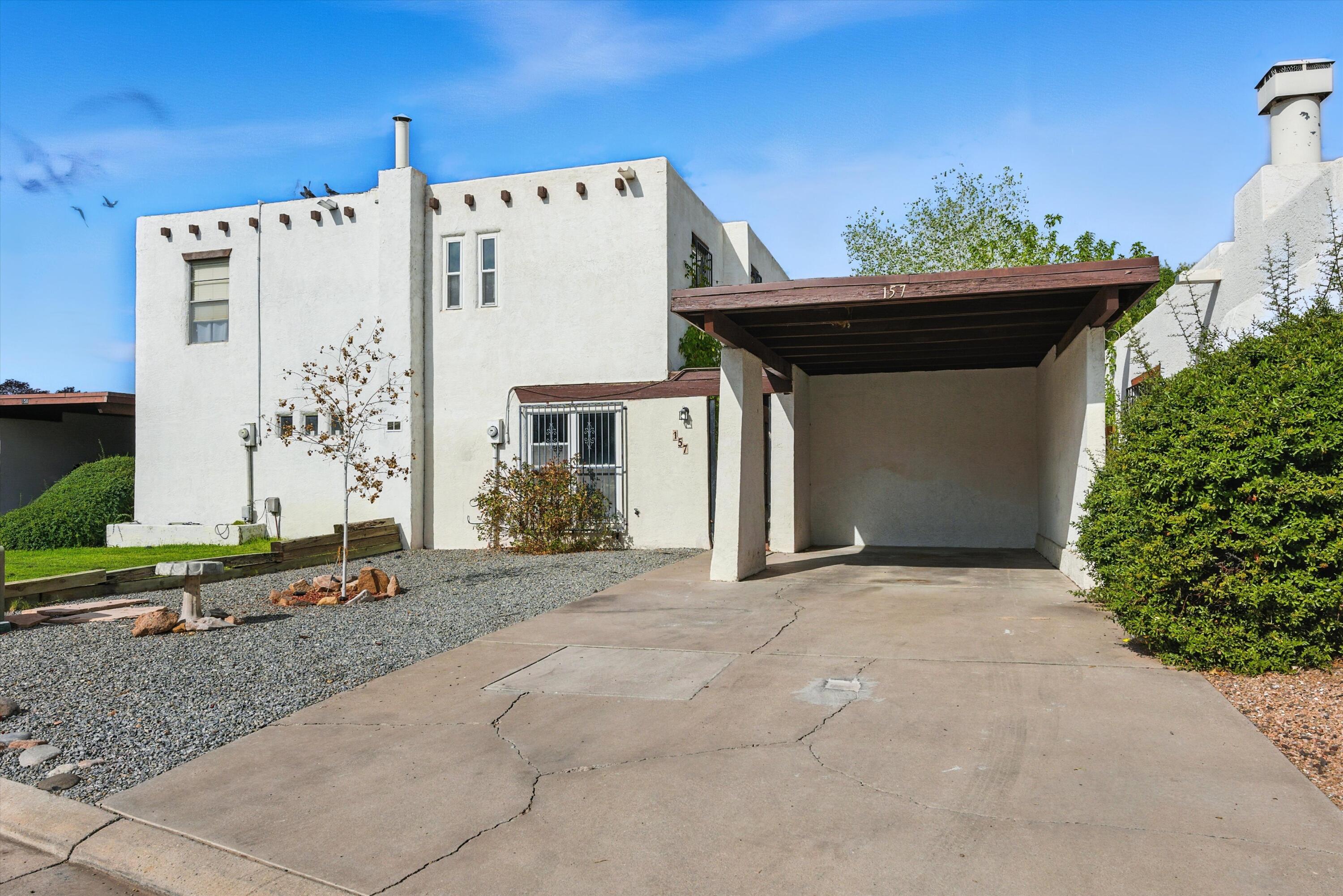 This 3-bedroom, 1.5-bath home offers a bright, functional layout with a spacious living room, cozy wood-burning stove, and an inviting kitchen with breakfast bar. Enjoy the low-maintenance yard with front landscaping included in the HOA. The community features a private park and is located near local shopping, dining, and recreational trails. Convenient access to I&#8209;40 adds to the appeal. Experience the comfort and ease of townhome living in a welcoming neighborhood setting.