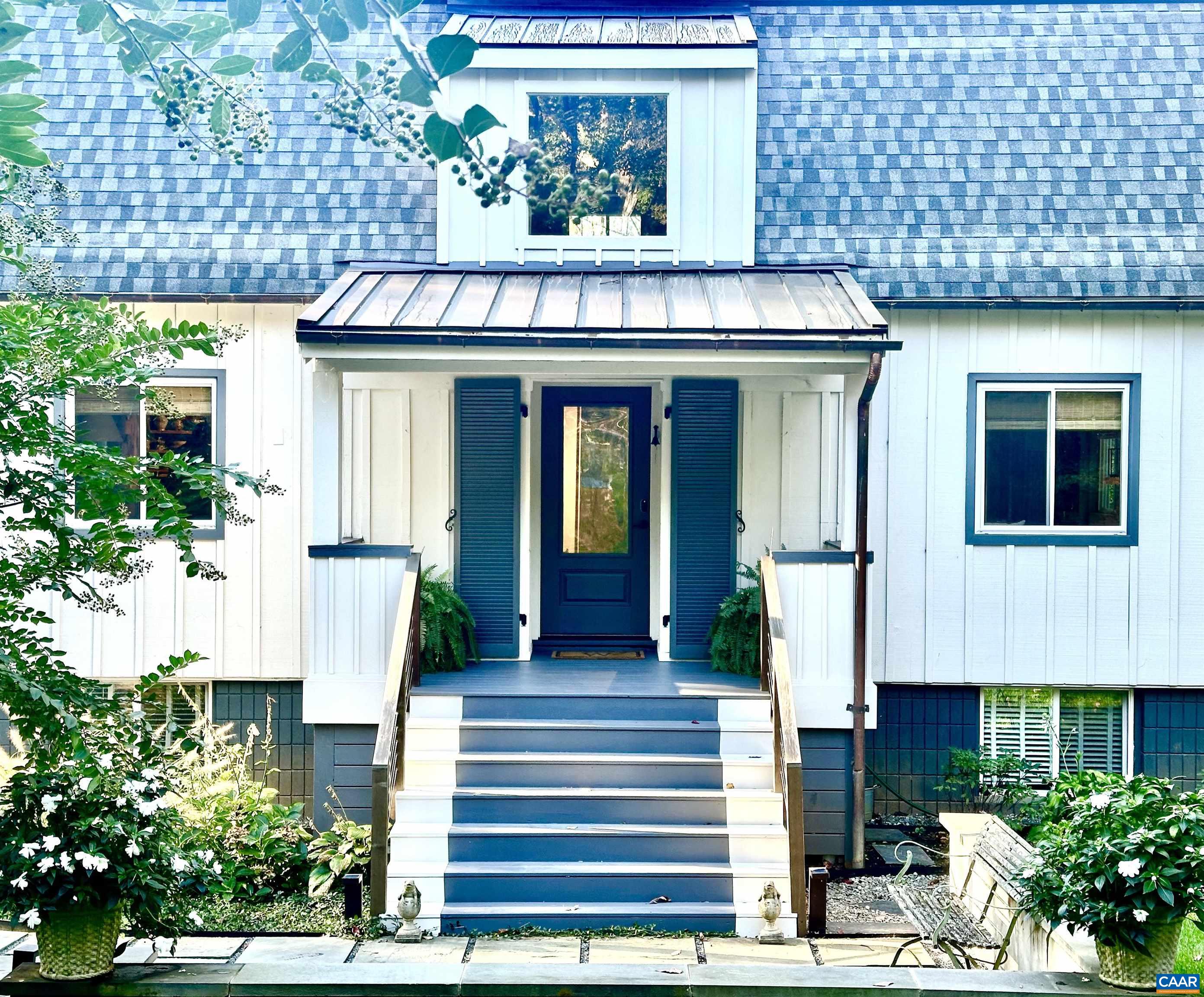 Stunningly reimagined Post and Beam home in the coveted Peacock Hill neighborhood backing up to over an acre of private, community-maintained land, creating a serene oasis. Blending timeless architecture with modern elegance, every detail has been thoughtfully curated to create spaces that are as inviting as they are stylish. Currently offering three bedrooms, with a light-filled art studio that can easily be converted back to a fourth, this home adapts beautifully to your needs. Experience the perfect balance of warmth, design, and functionality—you’ll want to make it yours the moment you walk through the door.  You won't find another neighborhood quite like Peacock Hill. A short drive to Charlottesville or Crozet, the location is unbeatable. Featuring miles of walking trails around the pond and throughout acres of wooded community land, plus tennis and pickleball courts, a playground for the kids, open spaces for picnics or relaxing!
