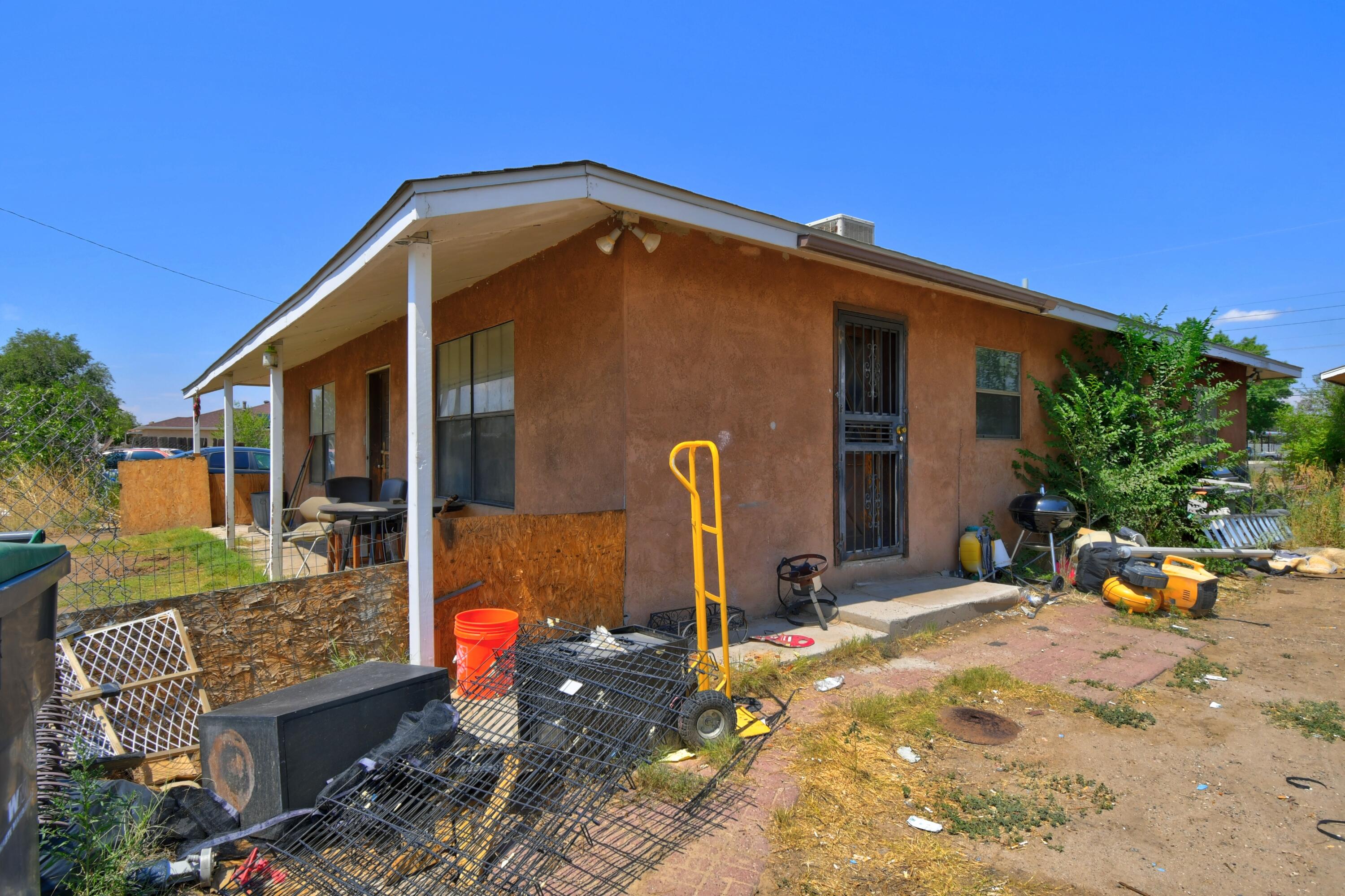 Welcome to this charming 3-bedroom, 2-bathroom fixer-upper nestled on a spacious .29-acre lot in the desirable Near North Valley area. This cozy home features a wood-burning stove in the living room, perfect for chilly evenings, and a kitchen with granite countertops and newer appliances, just waiting for your personal touch. The true gem of this property is the detached garage 3 car garage, which also has a wood burning stove and plumbing already installed for a future bathroom or Casita. The possibilities are endless.