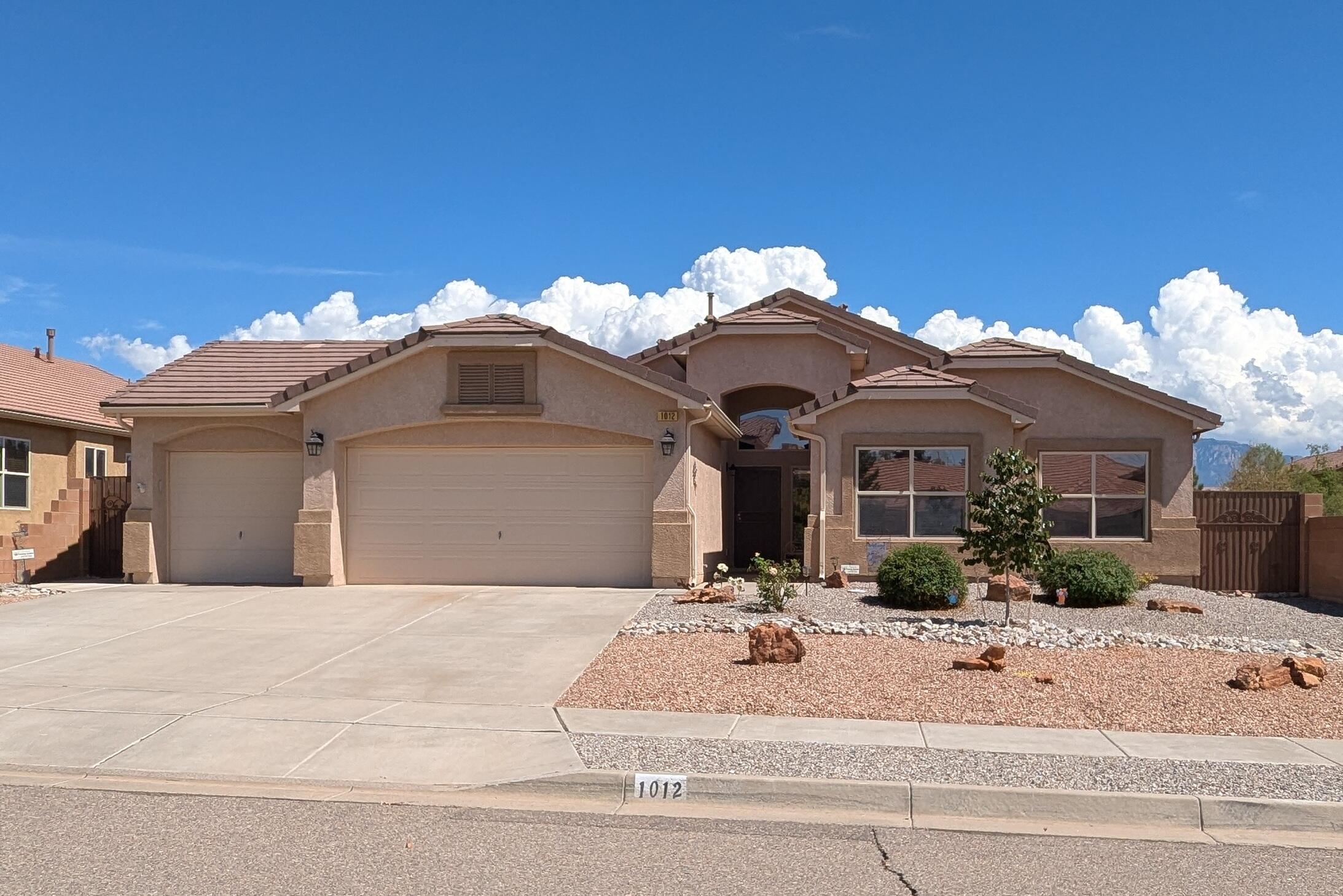 Welcome to this move in  ready home in Diamond Ridge. Enjoy the backyard with inground pool facing east, this home features cathedral ceilings and an open floor plan with a large formal dining room (or living room), 3 bedrooms with a 4th flex room. All appliances including the washer, dryer and additional refrigerator  remain with the home. Additional highlights include tinted windows, alarm system, water softener, tile and engineered hardwood floors throughout.