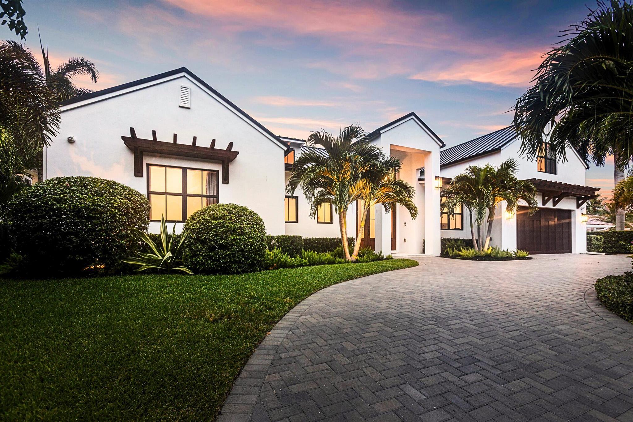 Where modern luxury meets effortless navigation, 1110 Fairview Lane is an unrivaled sanctuary for the yachting lifestyle. A newly built waterfront estate that redefines modern coastal living on Singer Island. Completed in 2022, this 6-bed, 4.5-bath residence encompasses 4,472 sq. ft. under air and 5,700 total sq. ft. of thoughtfully designed living space.Crafted with both elegance and flexibility in mind, the home features two main-floor primary suites, one with its own private kitchenette and lounge area, along with a dedicated office/flex space and a full guest suite above the garage with an ensuite bath. The main living area has soaring 21' ceilings and showcases a custom kitchen, complemented by a hidden scullery kitchen designed for seamless entertaining. Electric shades, Sonos sound system, and expansive glass doors frame sunlit interiors while connecting effortlessly to the covered loggia and outdoor living spaces. Perfect for relaxing beneath the twilight Florida skies.
For the boating enthusiast, the property offers 100 feet of prime waterfront, a new 90-ft dock, and a 24,000 lb. boat lift. Recent dredging ensures consistent deep-water access, providing peace of mind and effortless navigation for yachts and sport boats alike.
Nestled on one of Singer Island's most desirable streets, this residence is just moments from pristine white-sand beaches, world-class dining, championship golf, and the conveniences of Palm Beach and PBI Airport. More than a home, 1110 Fairview Lane is an elevated expression of versatile living and the ultimate in waterfront luxury.
Please see the features list for a full overview of all this home has to offer. Come experience low-maintenance living and the peace of mind only new construction provides!