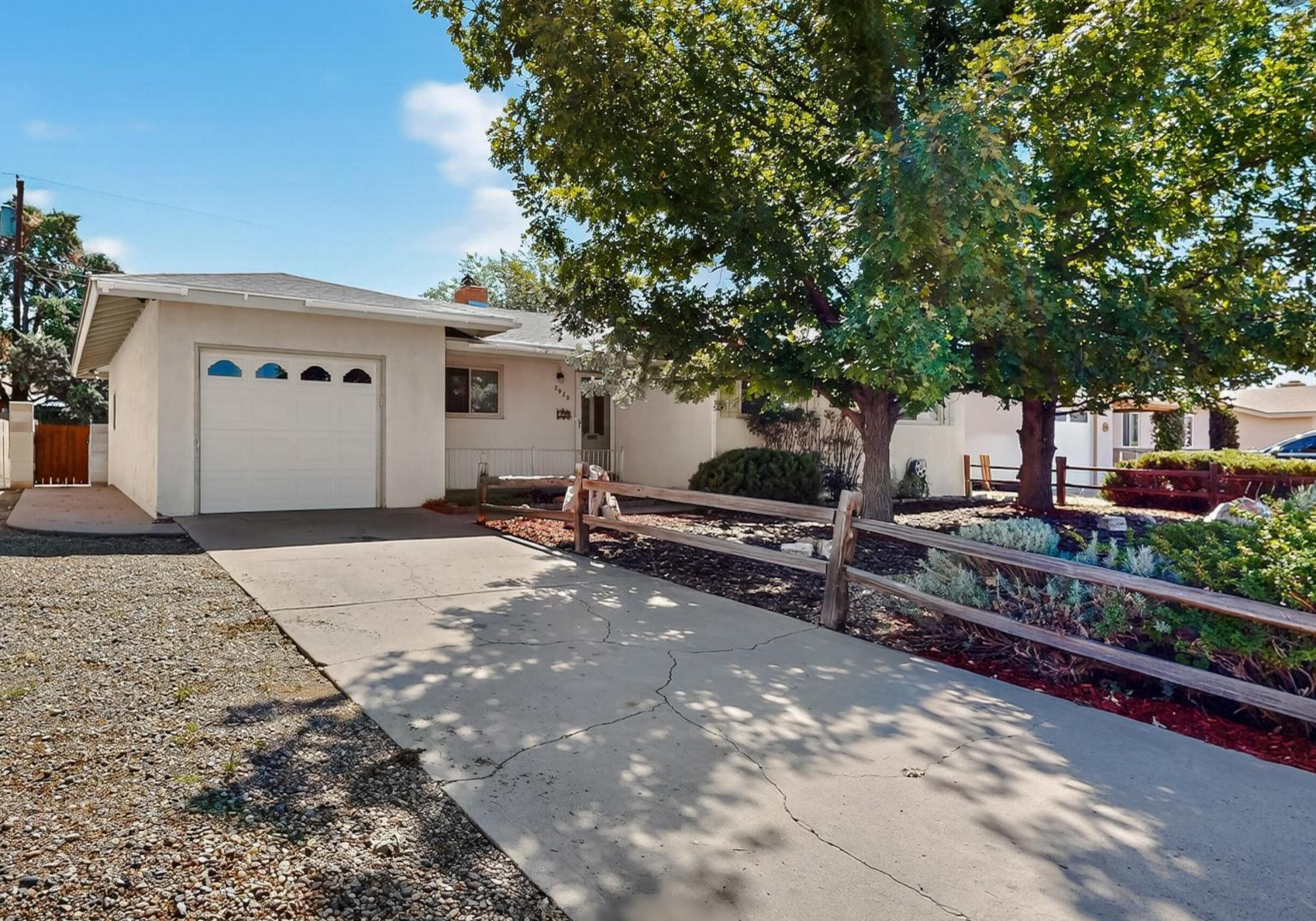 Discover this 3-bedroom, 2-bath single-owner gem centrally located in Albuquerque's desirable Uptown area. Offering 1,450 sq. ft. of comfortable living space, this home features freshly painted interiors, original wood floors in the main living areas. A large skylight and two large picture windows next to the sliding door that flood the living room with natural light. All appliances convey. New swamp cooler installed in August of 2025. Enjoy this home's location close to an elementary school and two neighborhood parks. The spacious backyard is ready for your creative vision, a garden, patio, or play space, the choice is yours. Don't miss this opportunity to own a beautiful Mossman home!