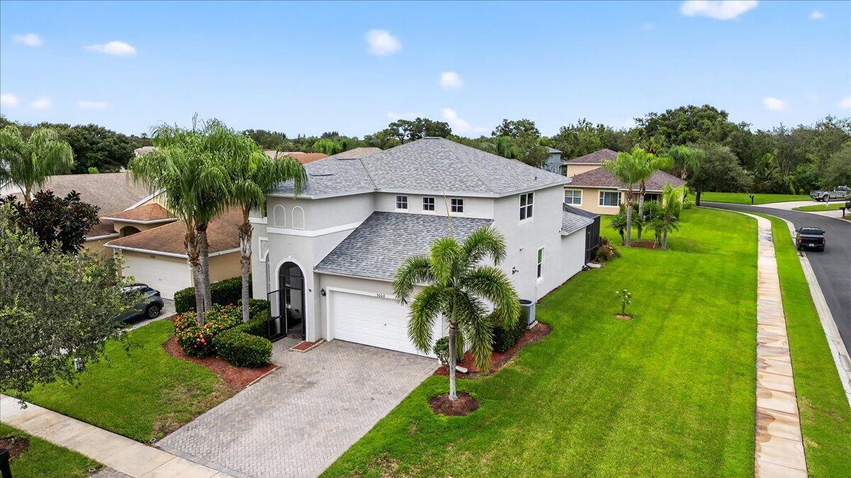 This 3 bed 2.5 bath 2,971 sqft home in the gated Citrus Springs community is a must see! Featuring 18' ceilings, LVP flooring, island kitchen w/ granite countertops & a natural gas stove. Through French doors, a screened paver patio extends the living space. The first-floor master suite has an updated bath & large walk-in closet. Upstairs, 2 guest beds, a full bath, and a versatile bonus space (home office or 4th bedroom conversion). Impact Windows & Doors, Roof 2022, HVAC 2018, Tankless Water Heater 2024. Just a short walk to Amenities: Community Center, gym, library, tennis & pickleball courts, pool. Low HOA fees