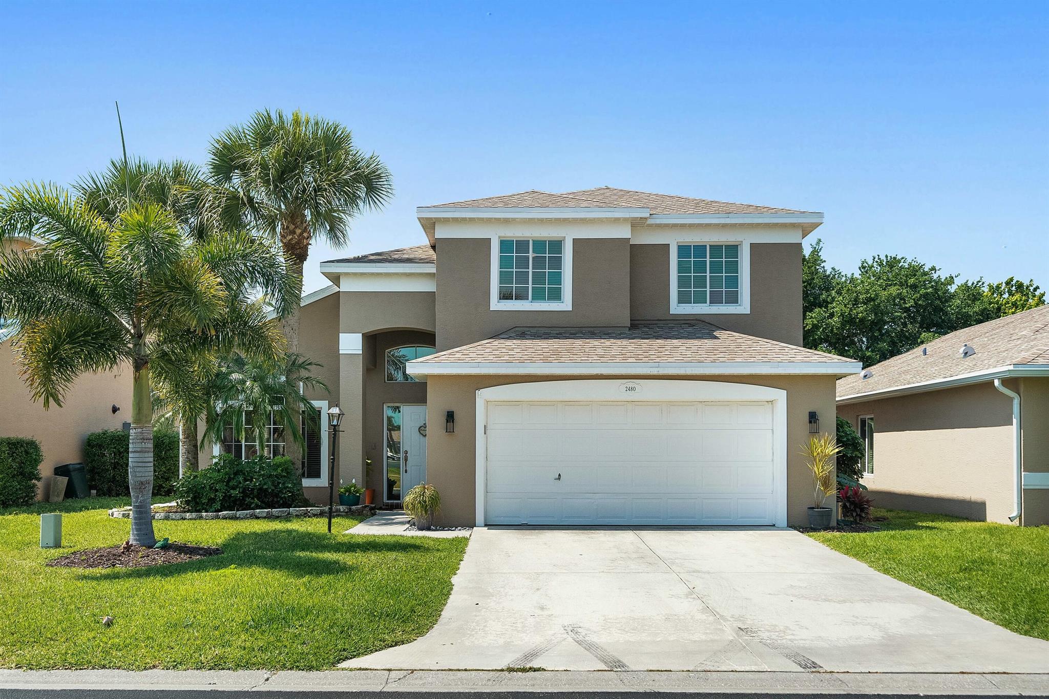 Gorgeous 4 bed 2.5 bath POOL home in desirable Springtree. Home boasts a 2022 Roof and updated kitchen with granite countertops, large island, and appliances. Brand new AC in 2020. The ground floor master suite includes a roman tub, walk-in shower, walk-in closet, and dual sinks. Large great room as you enter the home and a large open family room for plenty of entertaining space with a half bath. Upstairs has 3 beds with shared bathroom for the kids/guests to have their own space. With the newer roof and screened-in pool this home is sure to impress. Rare find in Stuart and will not last. Gated community and family friendly. Centrally located to great restaurants, shopping and the beautiful beaches.